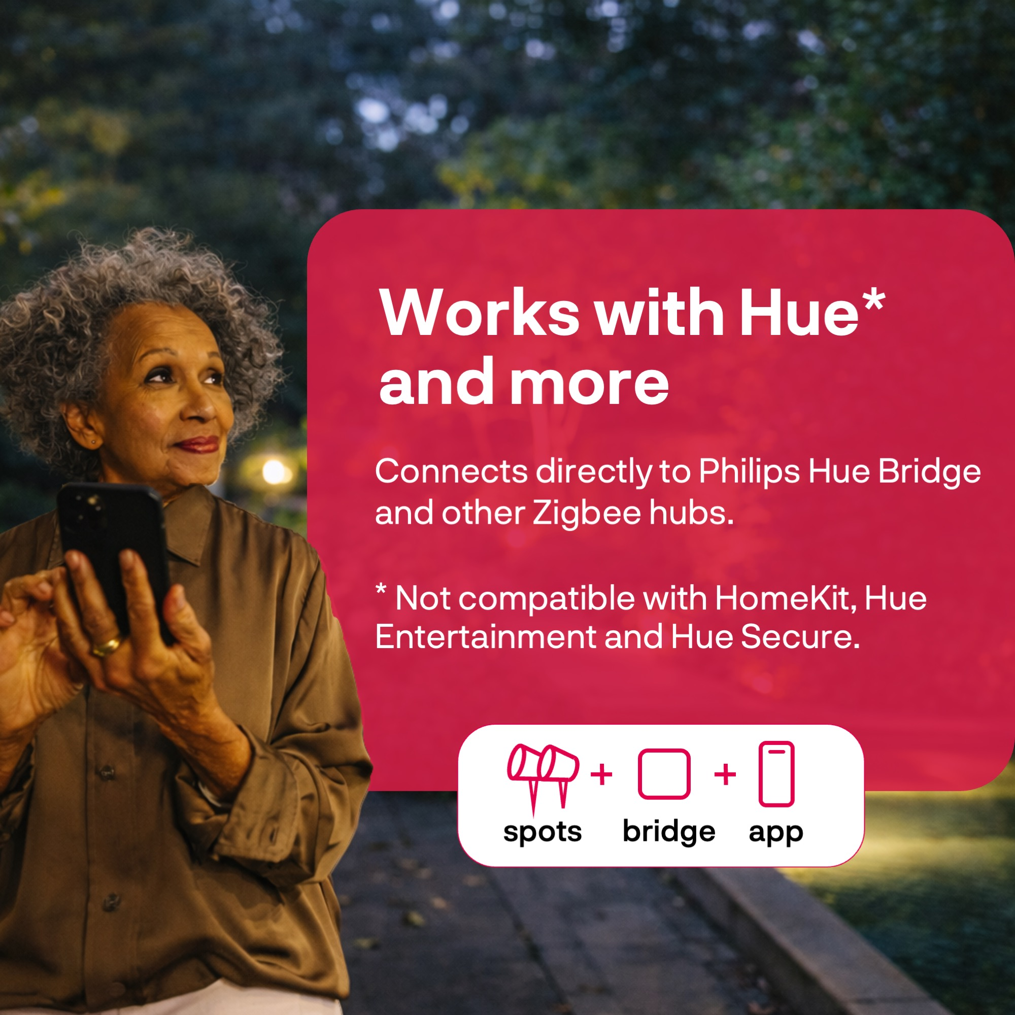 Woman with smartphone outdoors, text about Hue compatibility.