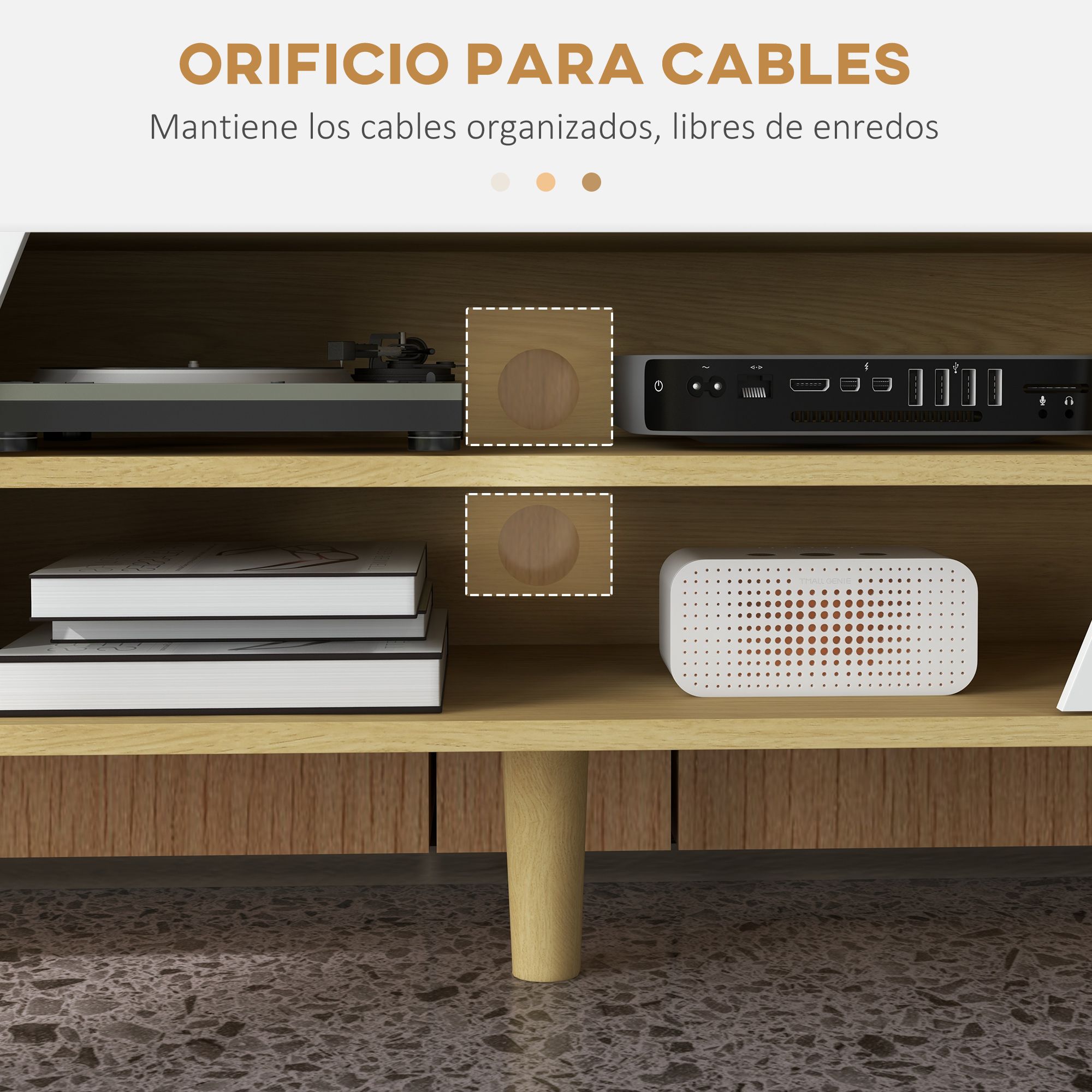 Un tocadiscos, ordenador, libros y altavoz en un estante de madera.