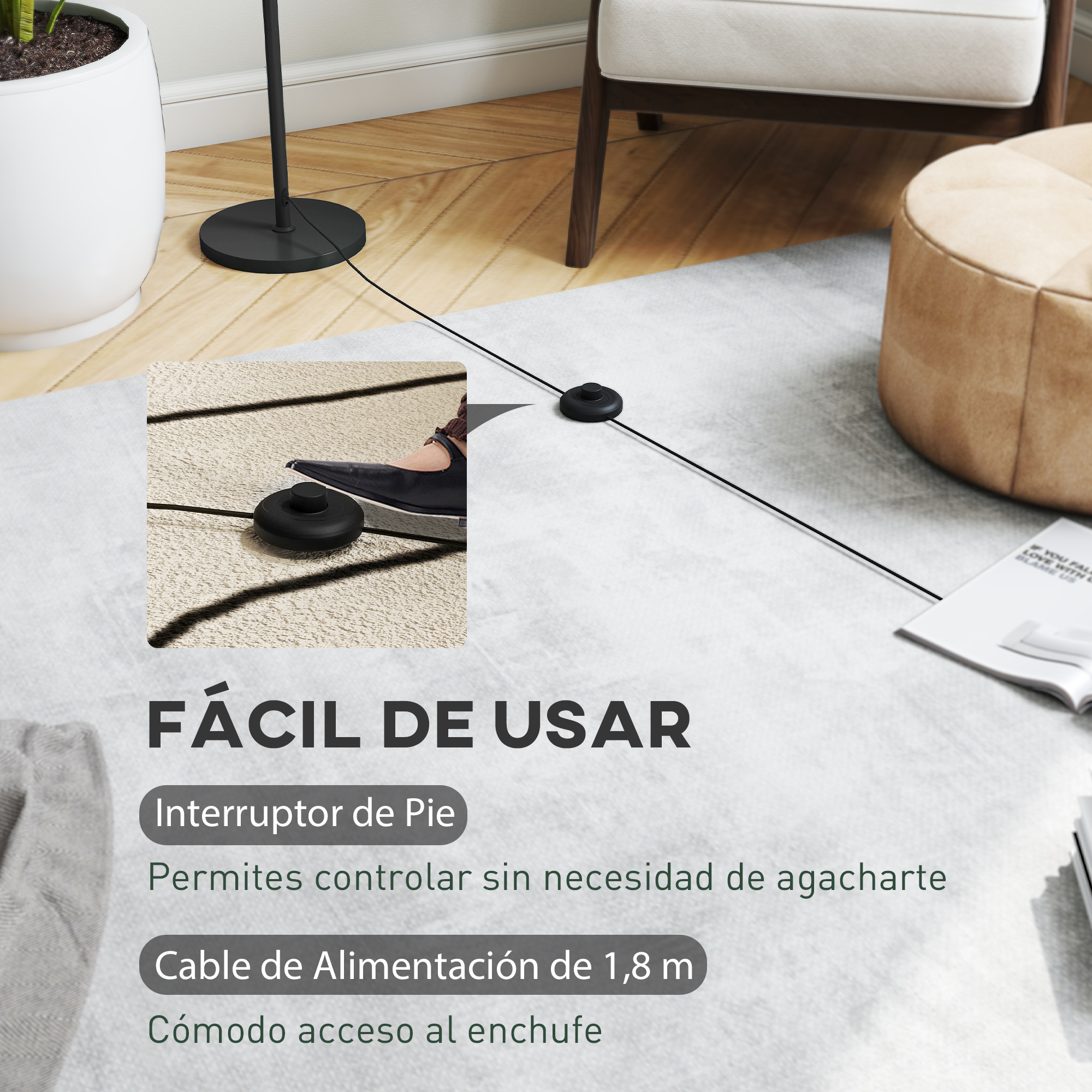 Interruptor de pie negro con cable sobre alfombra cerca de silla y puf.