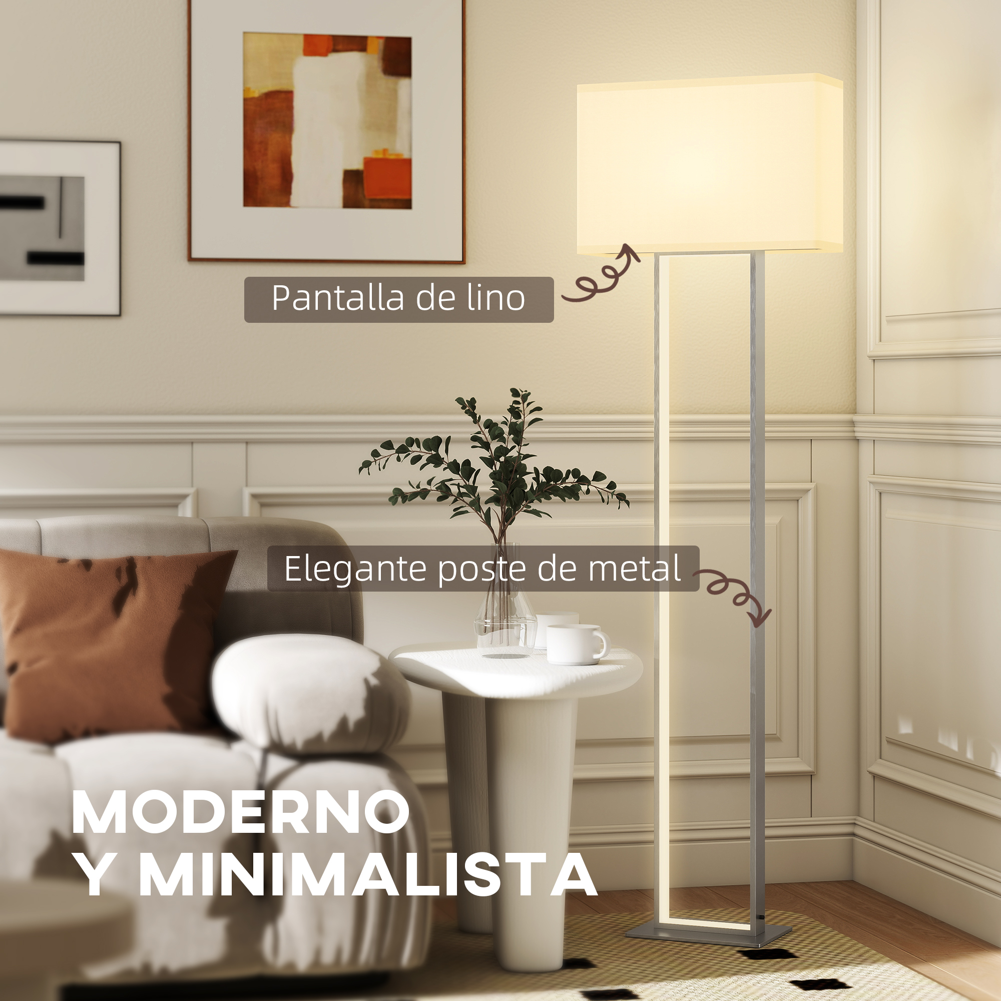 Una sala de estar moderna con sofá, mesa auxiliar, lámpara y arte.