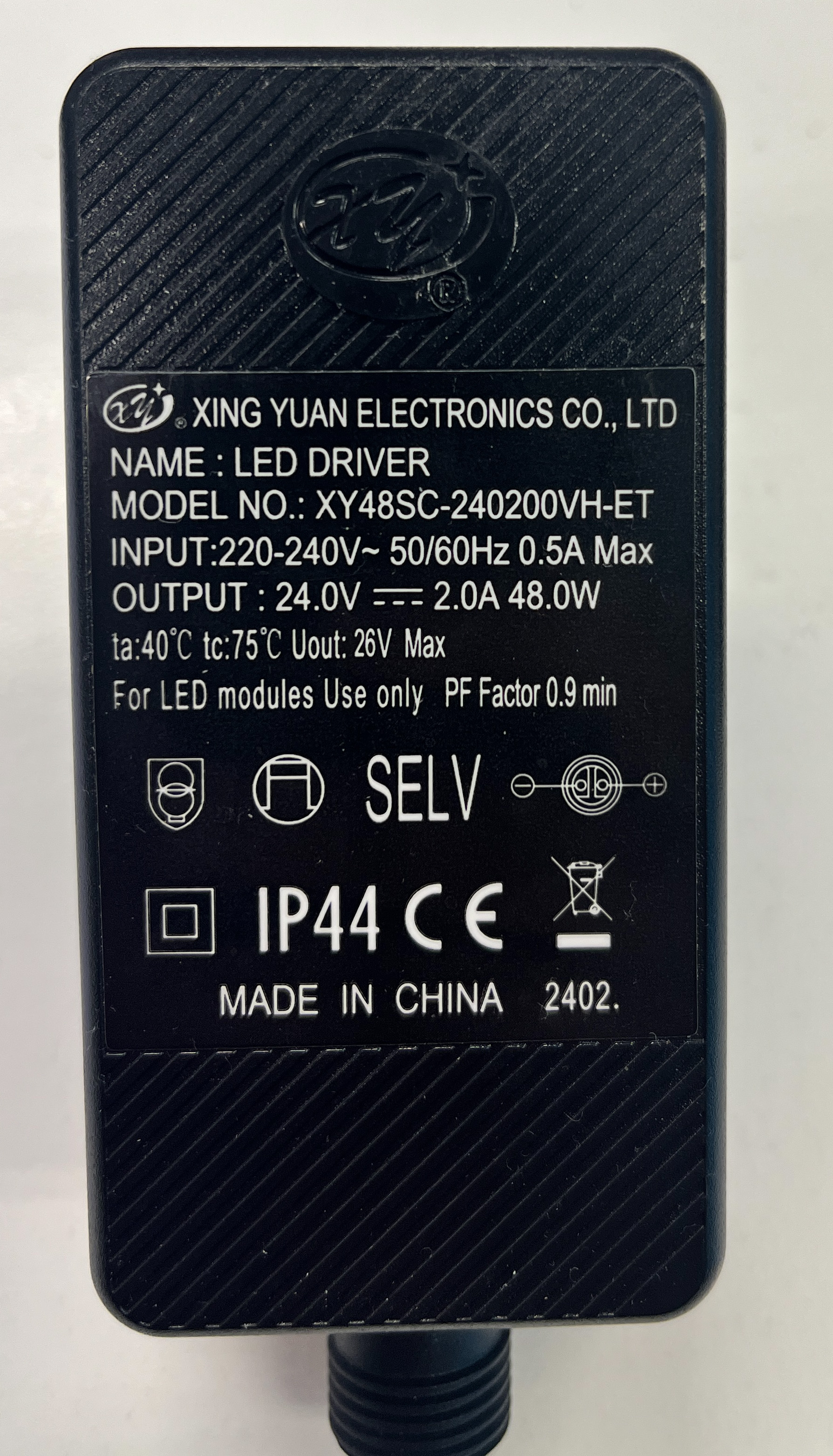 Black LED driver with label: Xing Yuan, Model XY48SC-240200VH-ET.