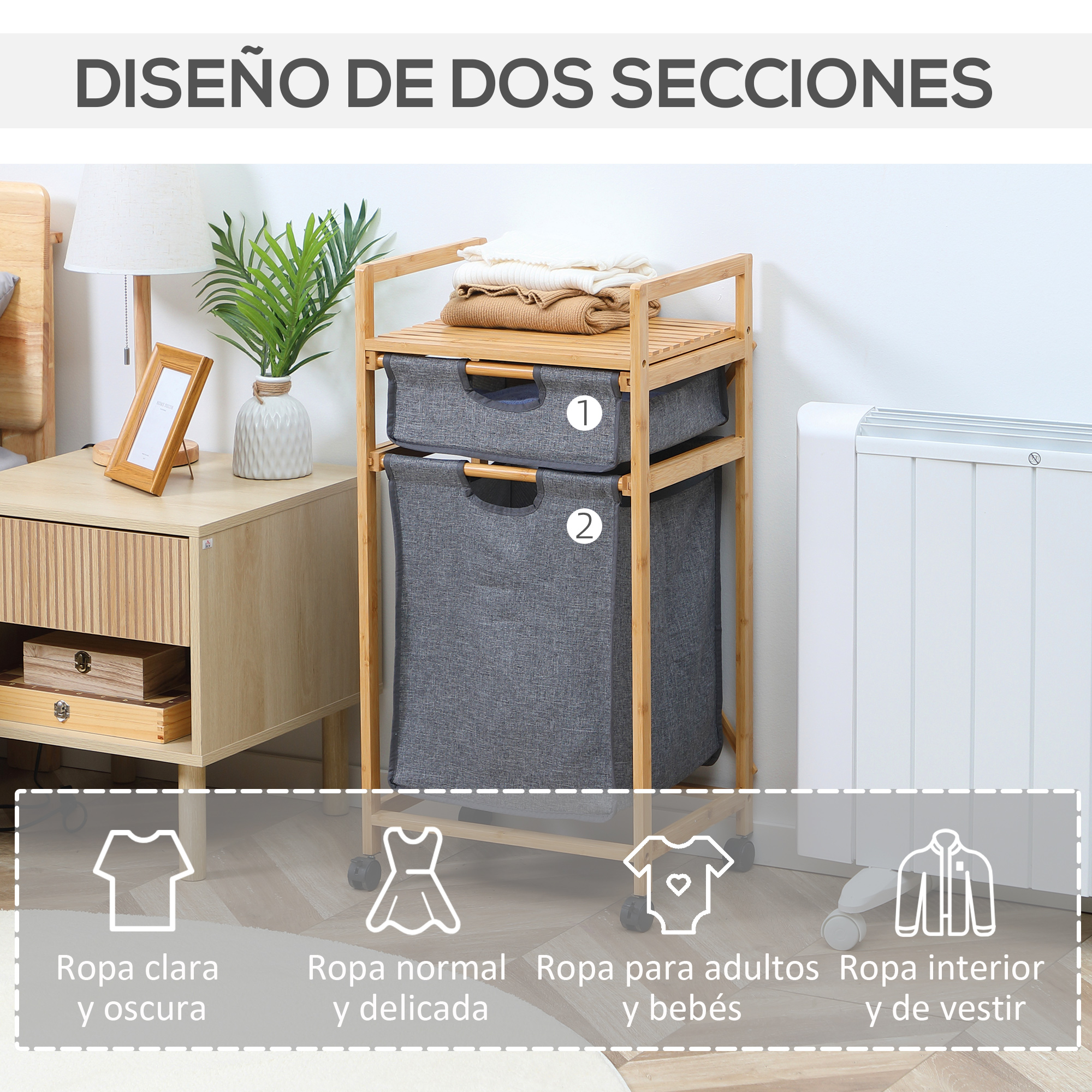 Un carrito de lavandería de bambú con dos secciones y ropa. Una mesita de noche al lado.