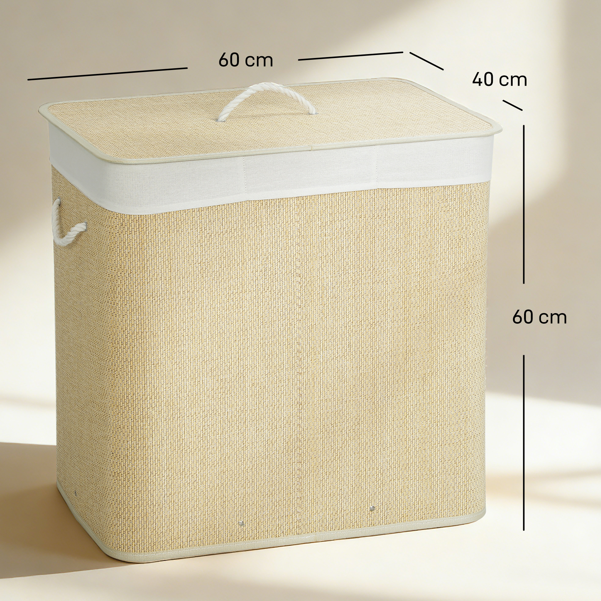 Cesto de ropa beige con borde y asas blancas, medidas 60x40x60 cm.