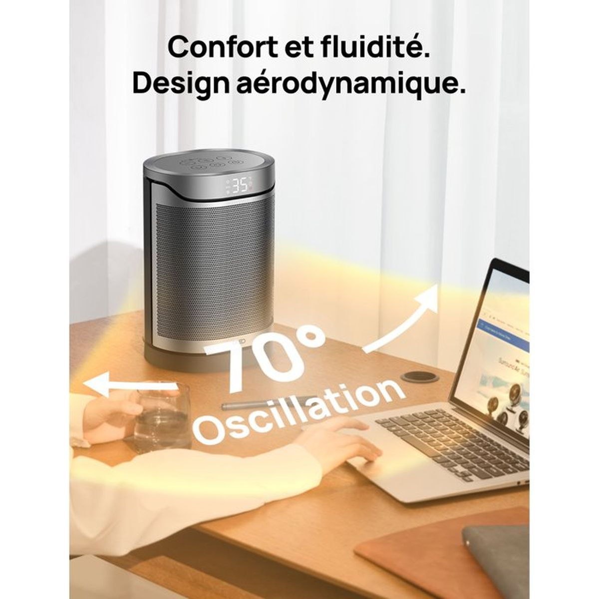 Ein silberner Lufterfrischer mit 70° Oszillation neben einem Laptop.