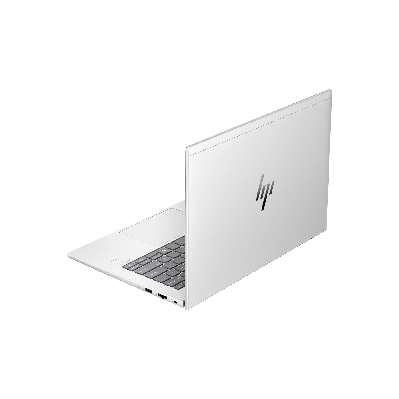 Gümüş rengi kapalı kapaklı dizüstü bilgisayar, kapakta HP logosu.