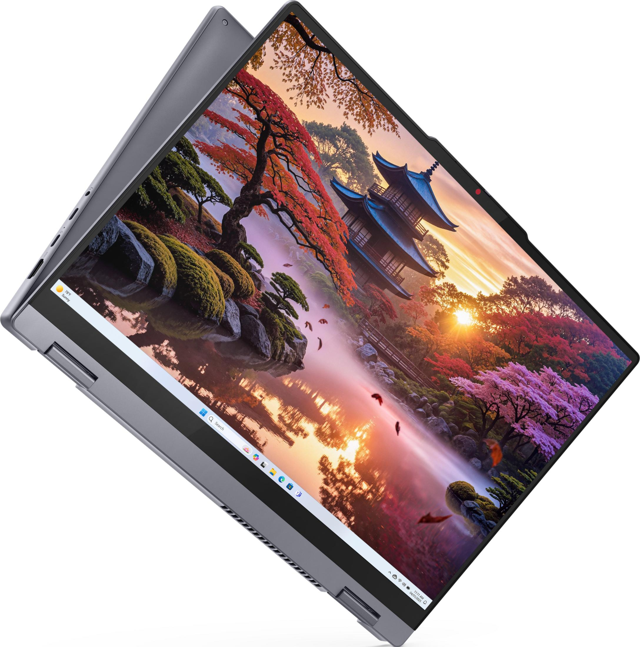 Laptop wyświetlający japoński ogród o zachodzie słońca.