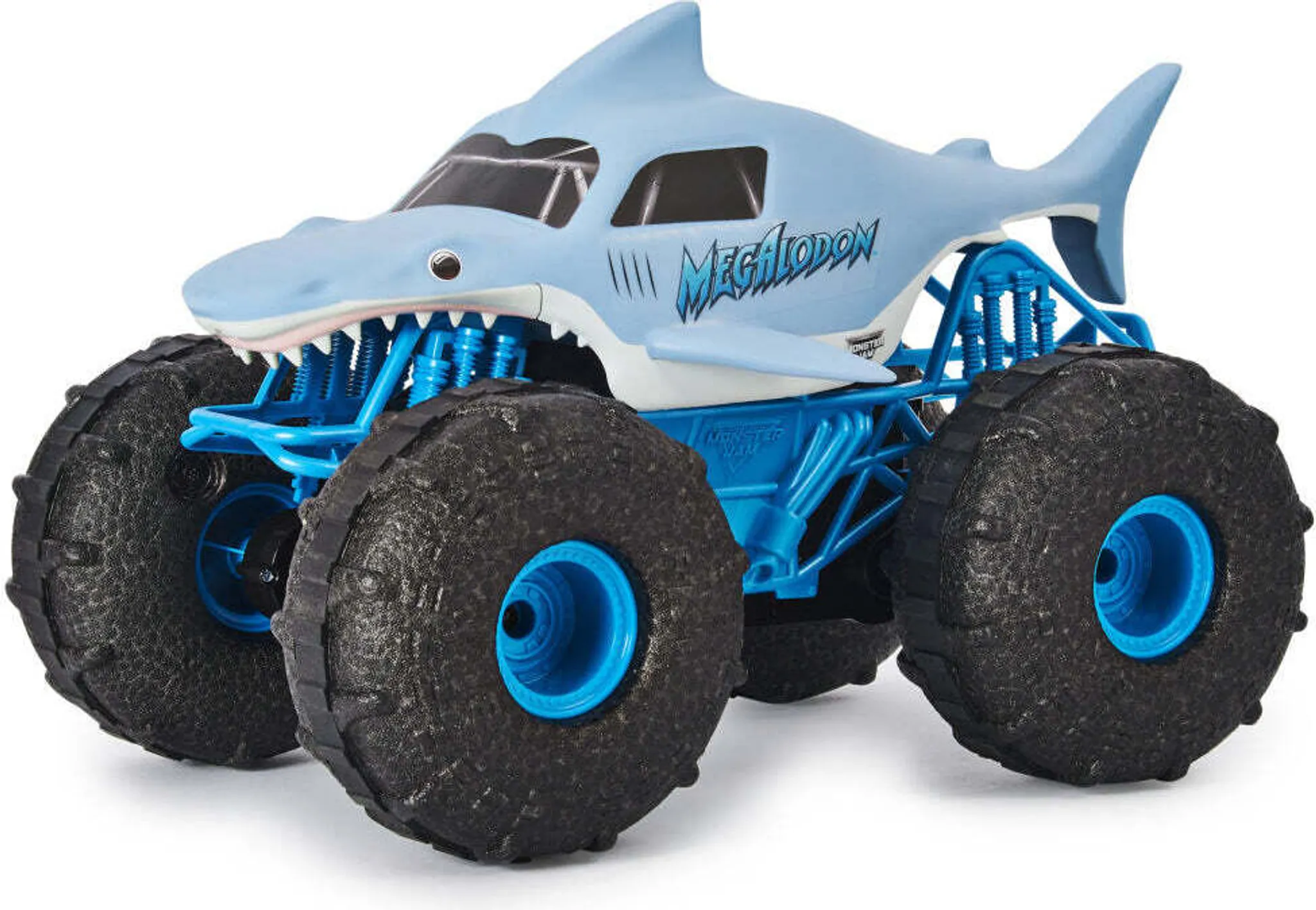Ein blauer Monster-Truck in Hai-Optik mit großen schwarzen Rädern und blauer Federung.