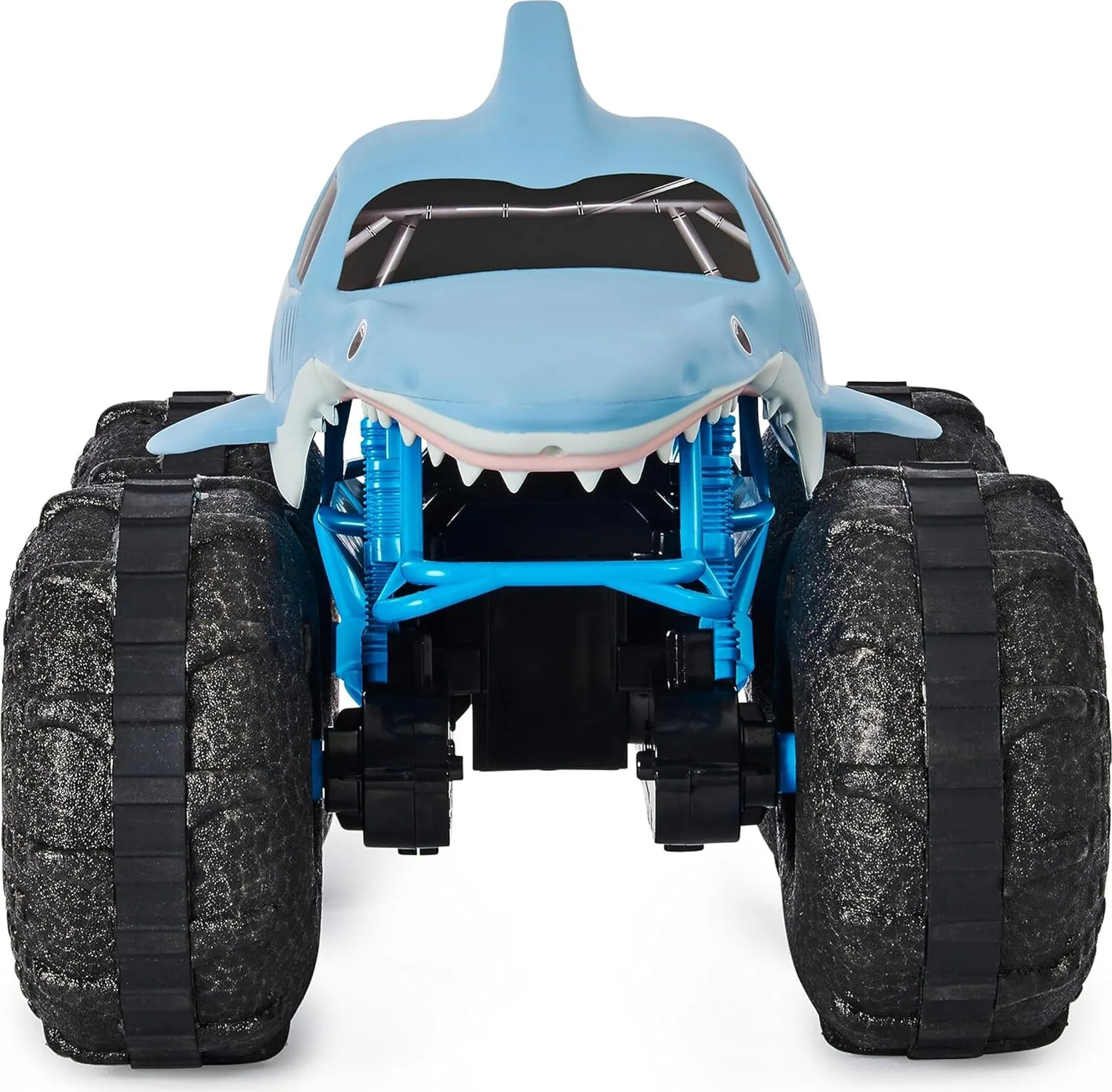 Ein blaues Monster-Truck-Spielzeug in Hai-Form mit großen schwarzen Rädern.