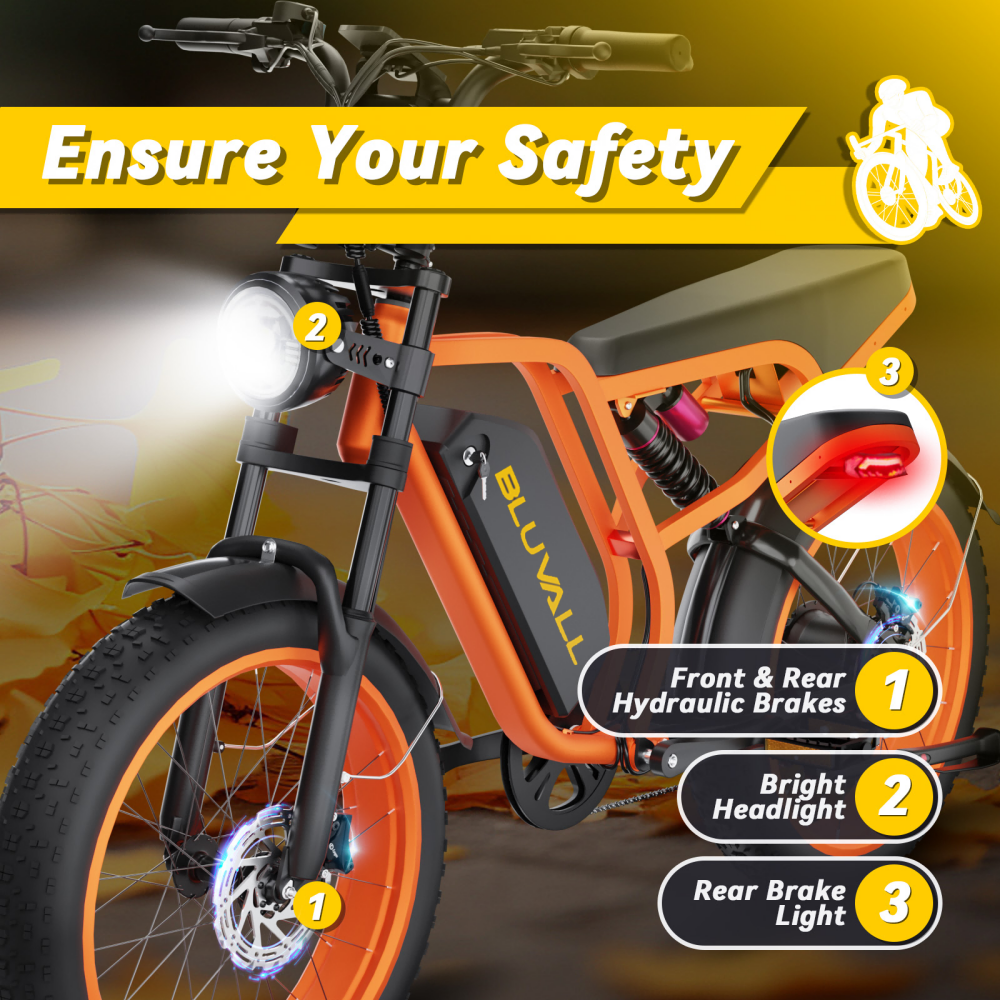 Pomarańczowy e-bike z hamulcami przednimi i tylnymi, jasnym światłem i światłem stopu.