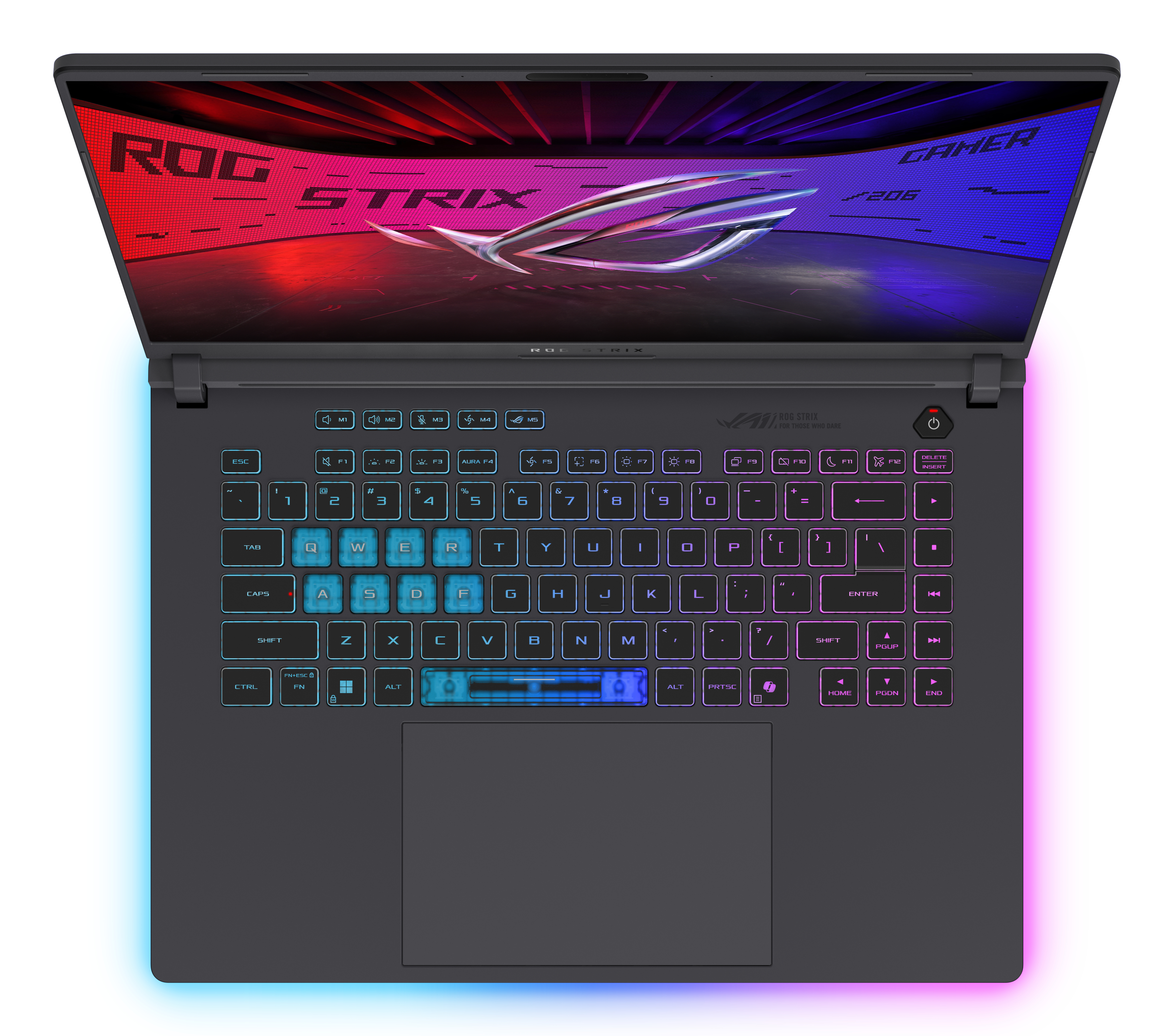 An open laptop with a backlit keyboard and the ROG STRIX logo on the screen.