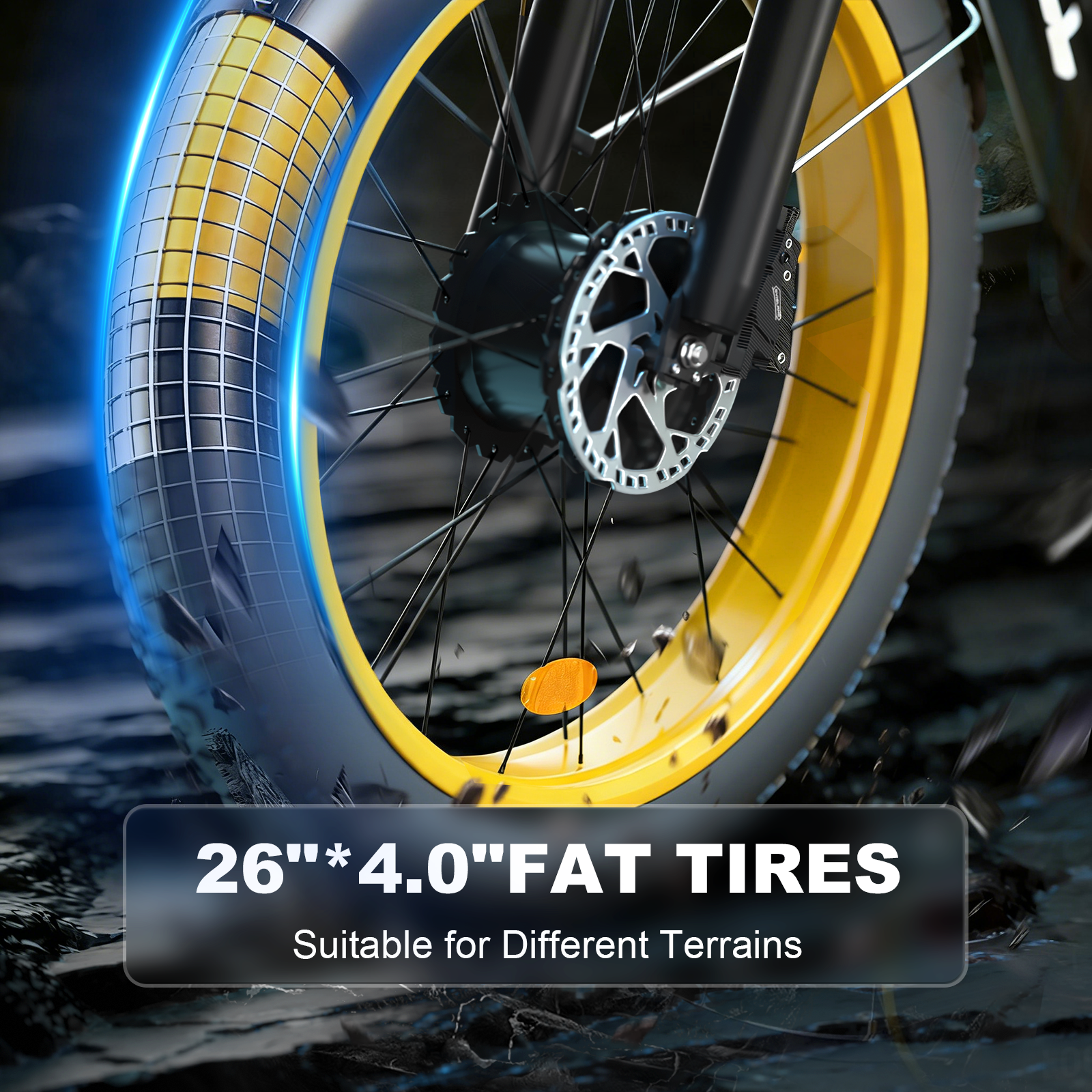 Zbliżenie koła roweru z szeroką oponą i żółtą obręczą.