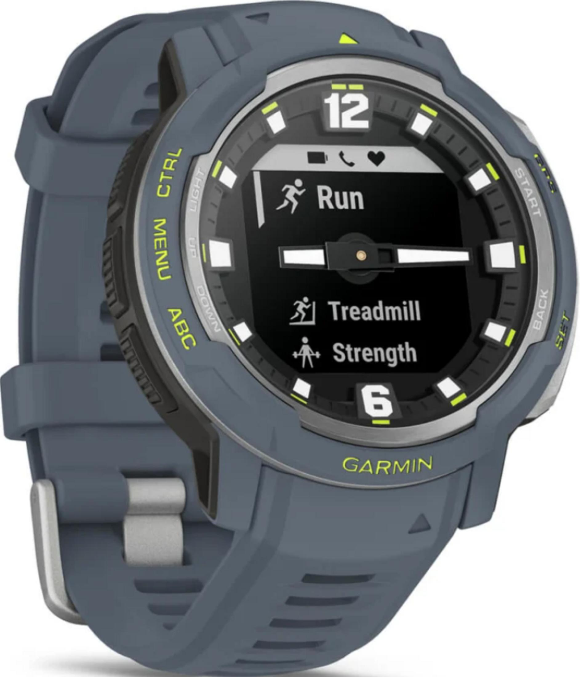 Szary smartwatch Garmin wyświetlający tryby sportowe: Bieg, Bieżnia, Siła.