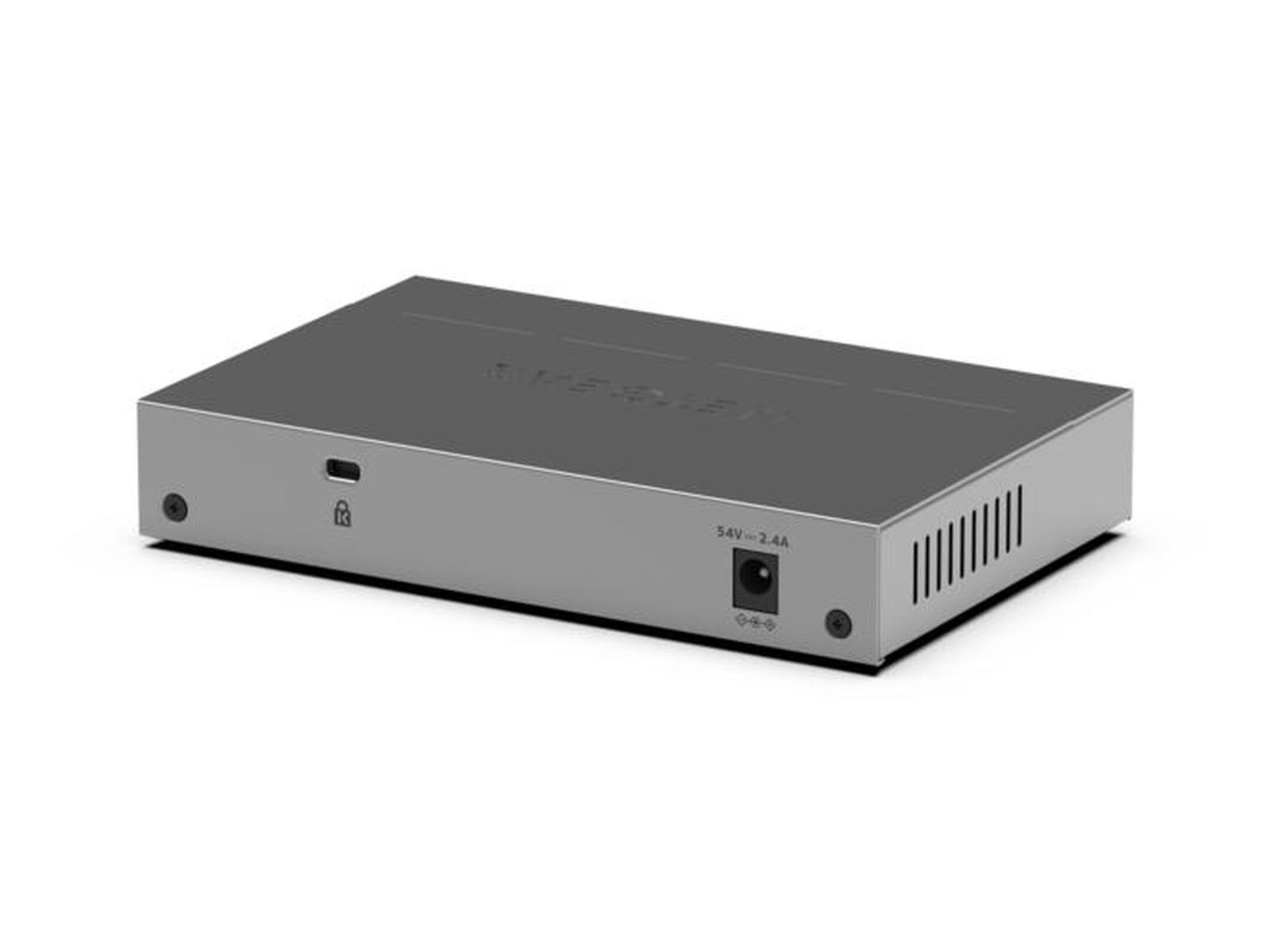Switch di rete argentato con porta di alimentazione e spie di stato su sfondo bianco.