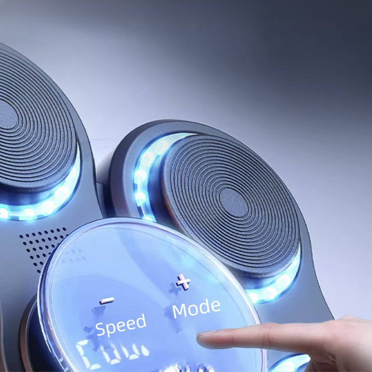 Zbliżenie urządzenia z niebieskimi światłami i wyświetlaczem pokazującym prędkość.