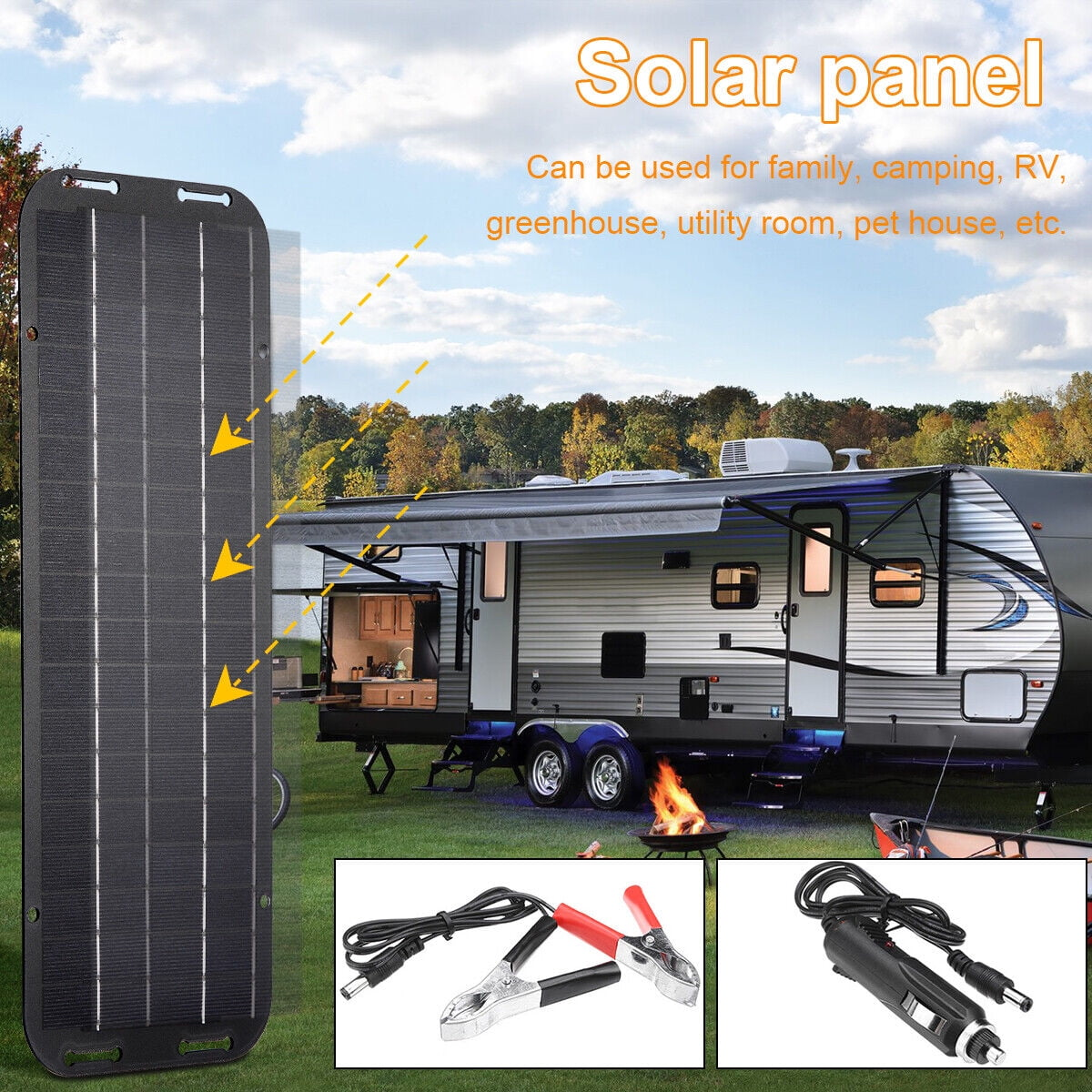 Solarpanel vor einem Wohnmobil mit Zubehör und Lagerfeuer.