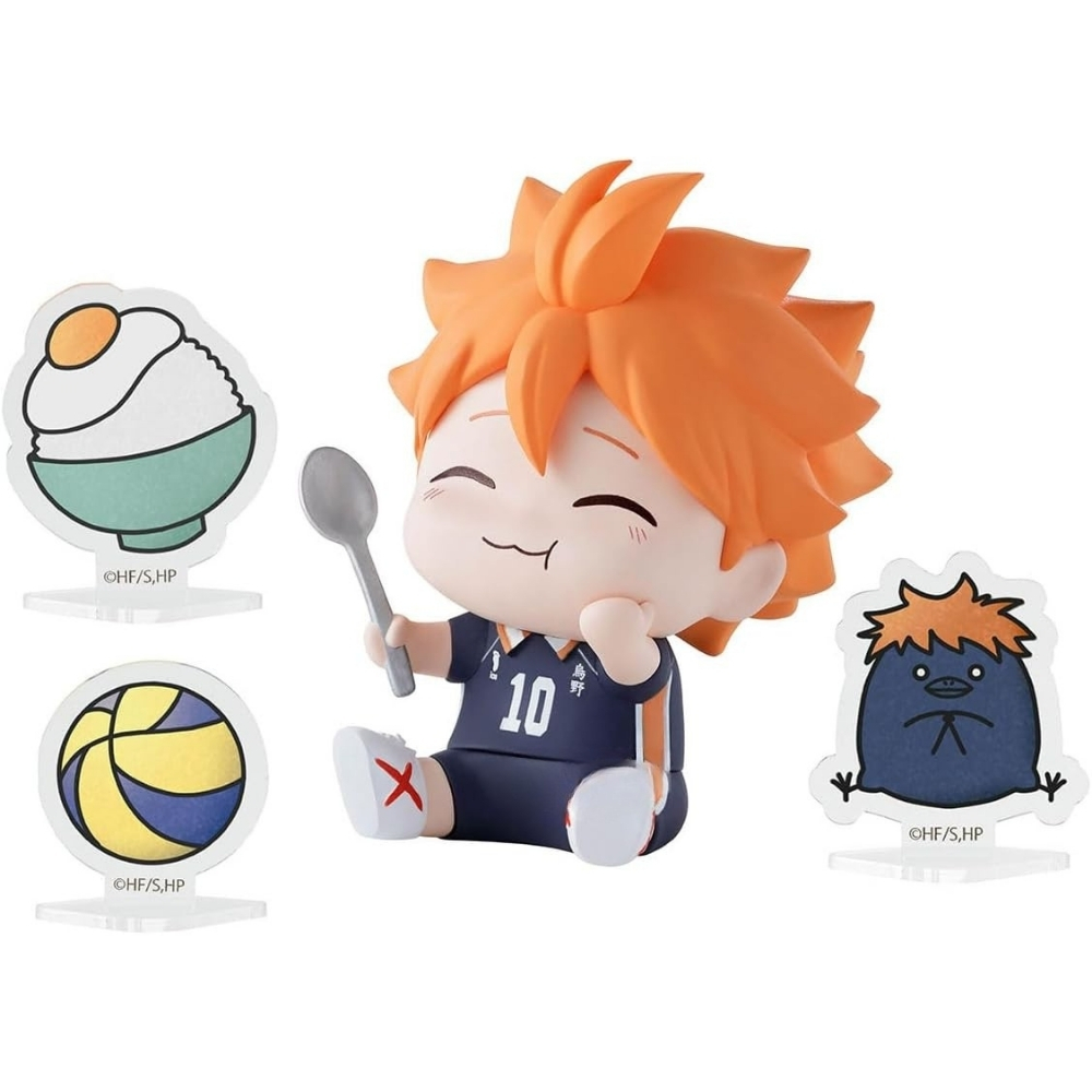 Eine Figur mit orangenem Haar isst mit einem Löffel, daneben ein Ball, eine Reisschüssel und ein Vogel.