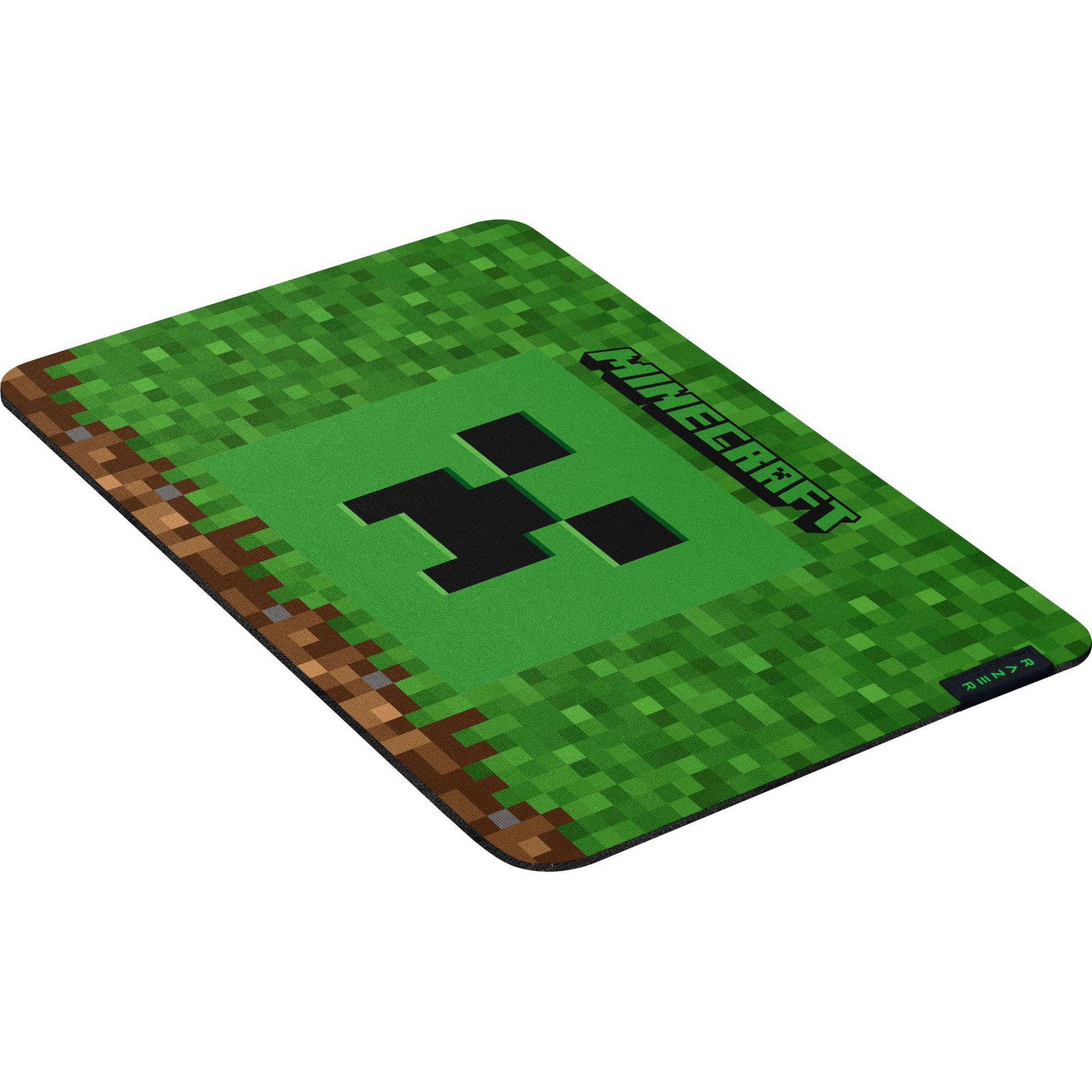 Alfombrilla de ratón de Minecraft con cara de Creeper en hierba y tierra.