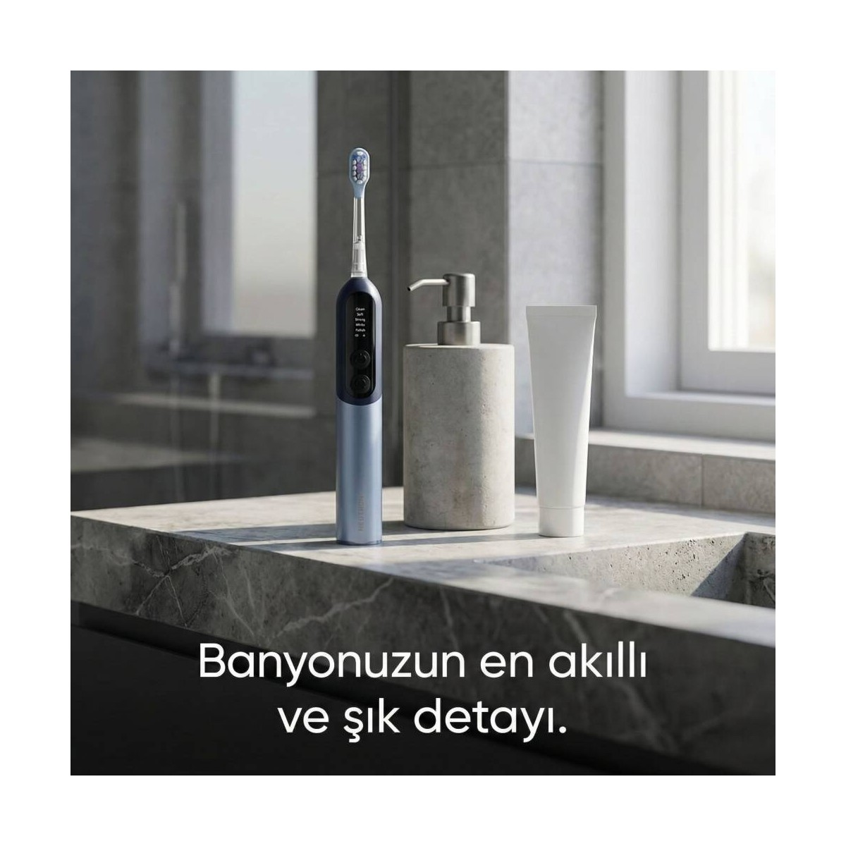 Sabunluk ve beyaz tüple birlikte taş tezgahta mavi elektrikli diş fırçası.