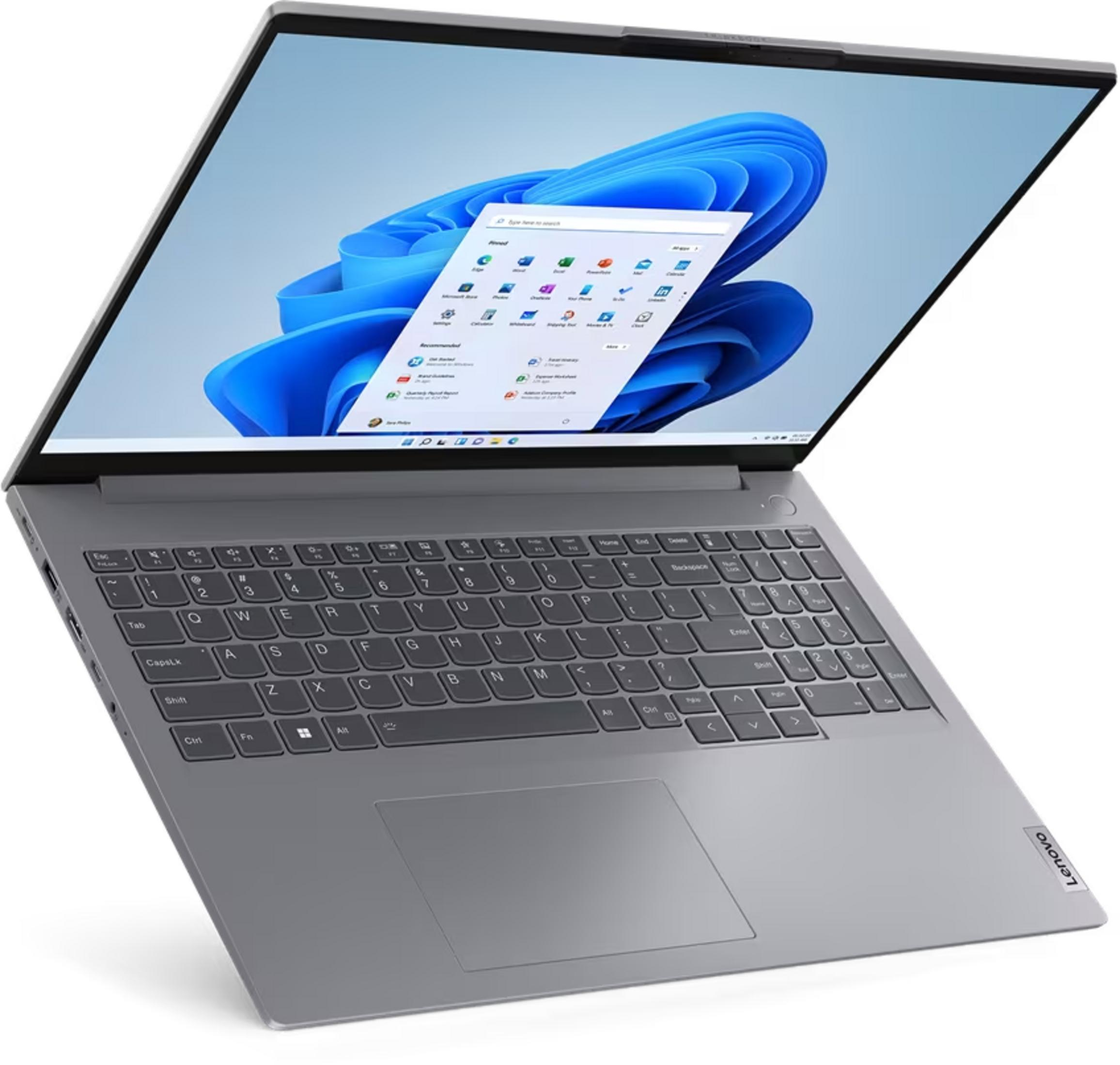 Grauer Laptop mit geöffnetem Bildschirm, der das Windows 11 Startmenü zeigt.