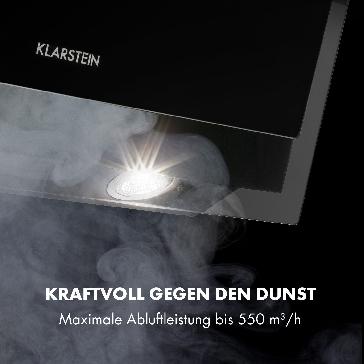 Dunstabzugshaube saugt Rauch ab, beleuchtet von einer LED.
