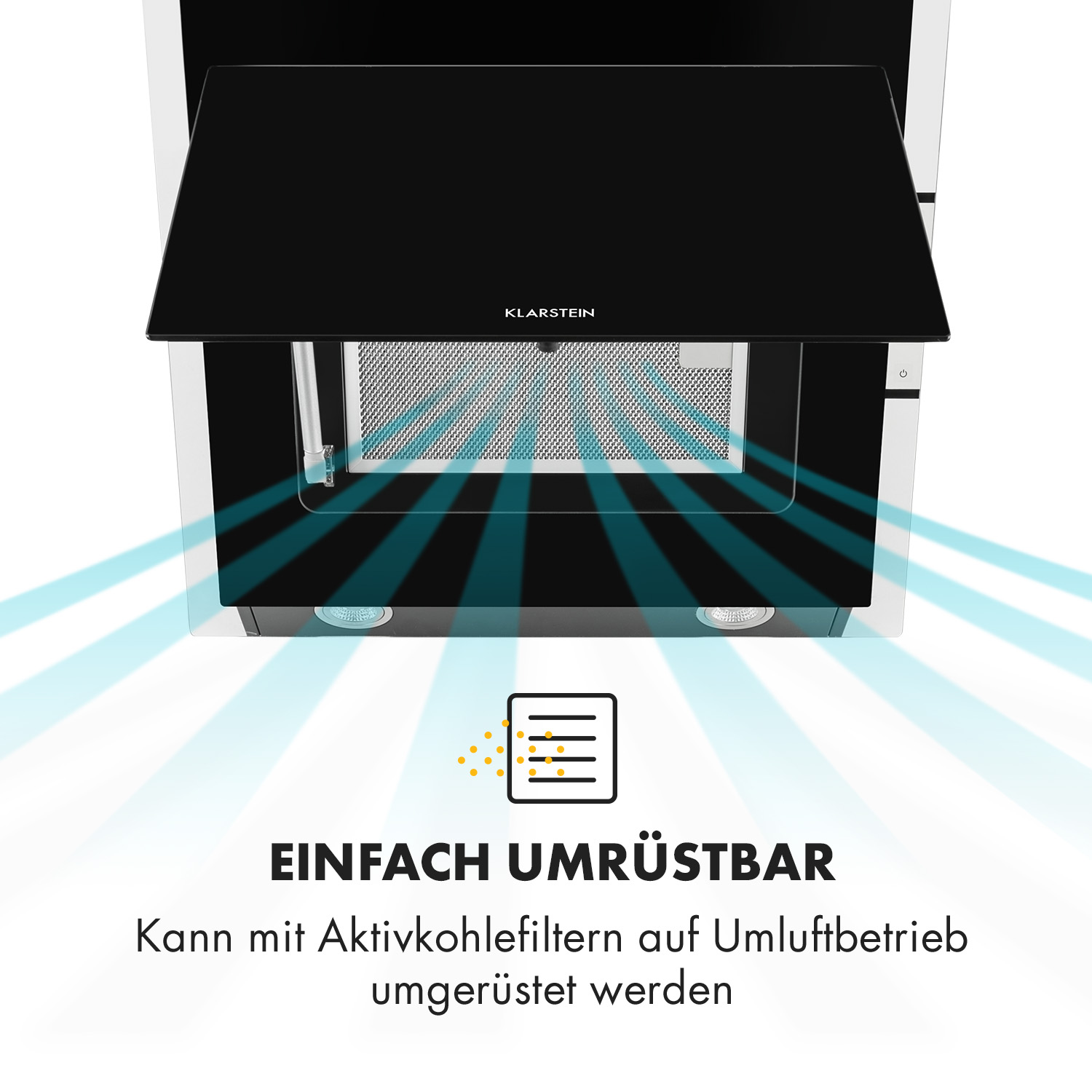Eine Dunstabzugshaube mit schwarzer Glasfront, die Luft nach unten bläst.