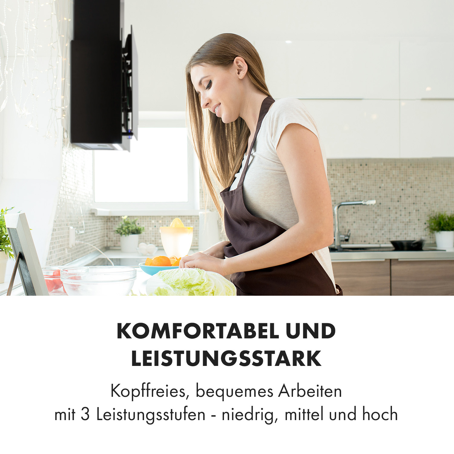 Frau bereitet in einer Küche einen Salat zu. Text: Komfortabel und leistungsstark.