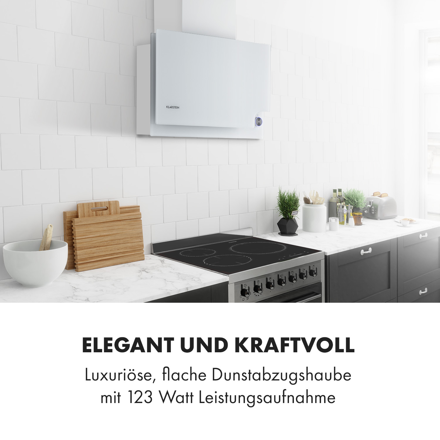 Eine weiße Dunstabzugshaube über einem Kochfeld in einer modernen Küche.
