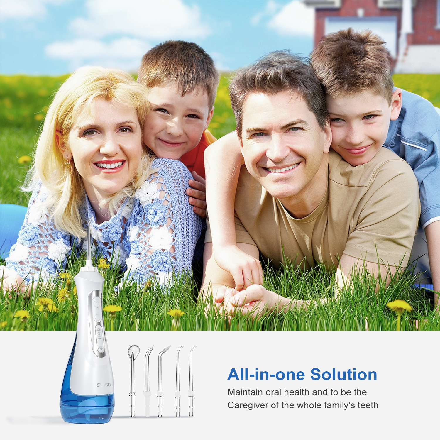 Rodzina leży na trawie, obok niej leży irygator do ust.