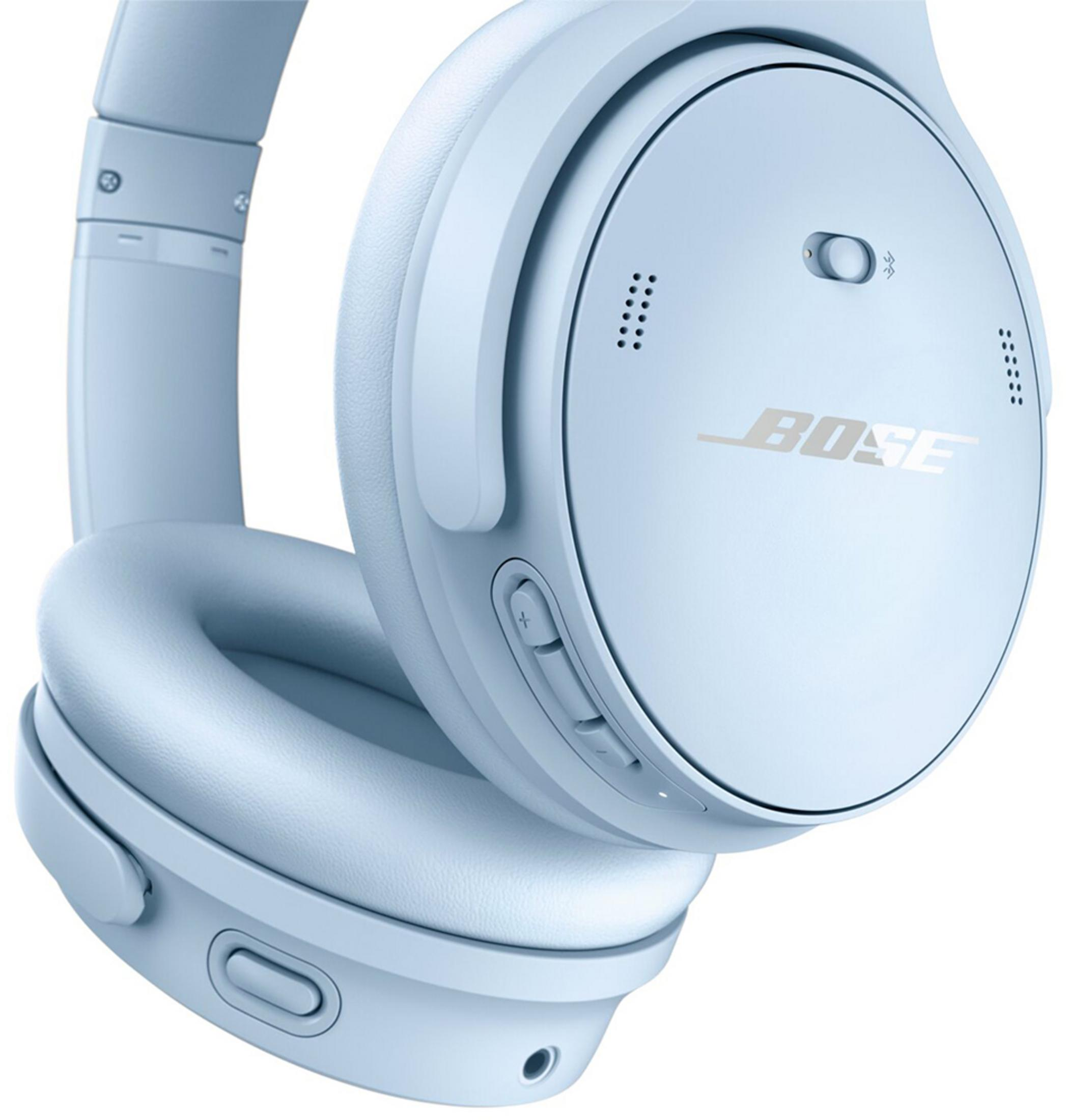 Cuffie Bose azzurro chiaro con logo argento e controlli.