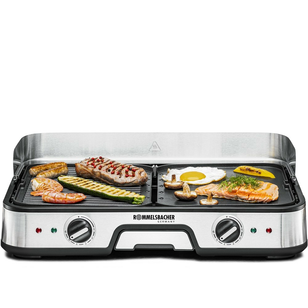 An electric grill with two plates, featuring grilled foods like steak, sausage, shrimp, zucchini, salmon, egg, and mushrooms.