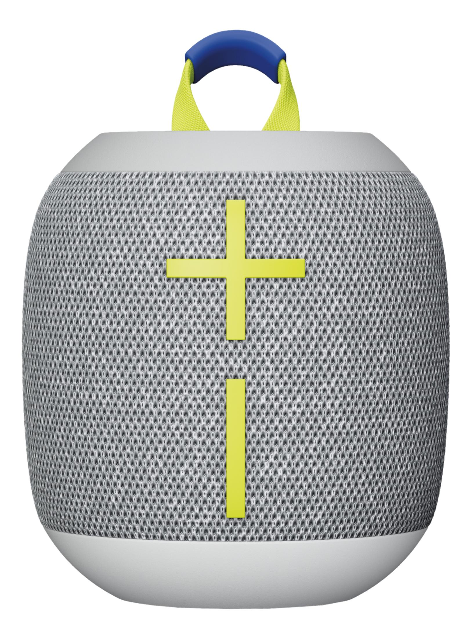 Szary głośnik z żółtym znakiem plus i niebieskim uchwytem.