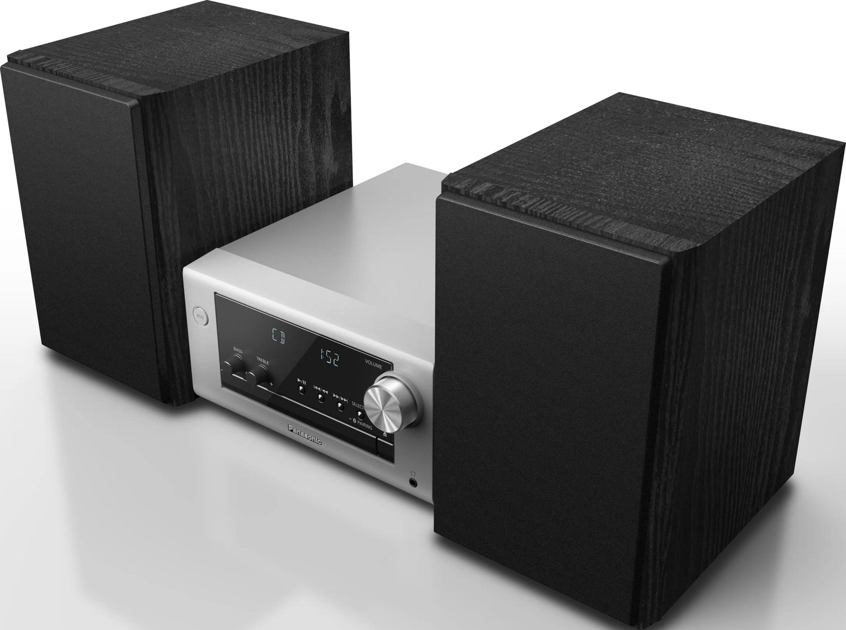 Silberner Stereo-Receiver mit schwarzen Lautsprechern und digitaler Anzeige.