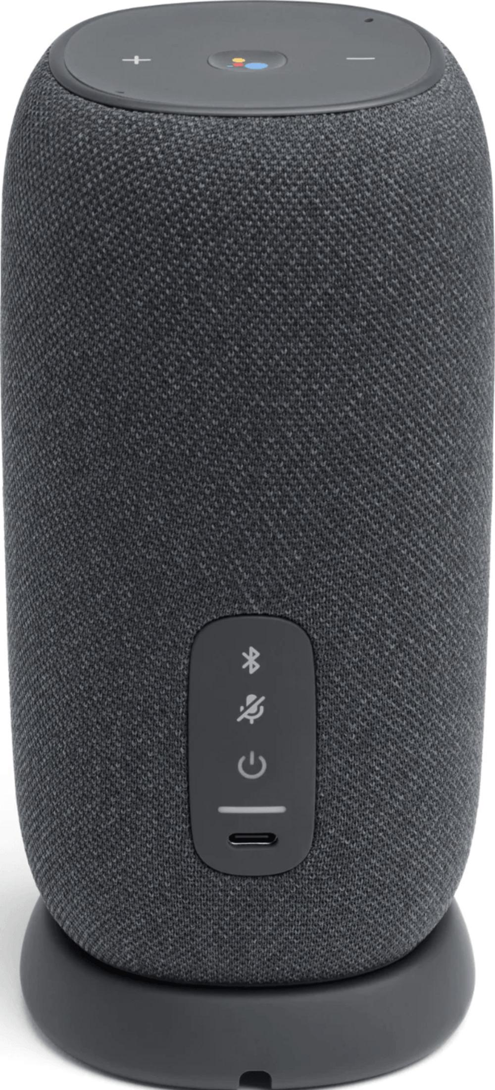 Szary głośnik cylindryczny z tkaniny z kontrolkami i portem ładowania.