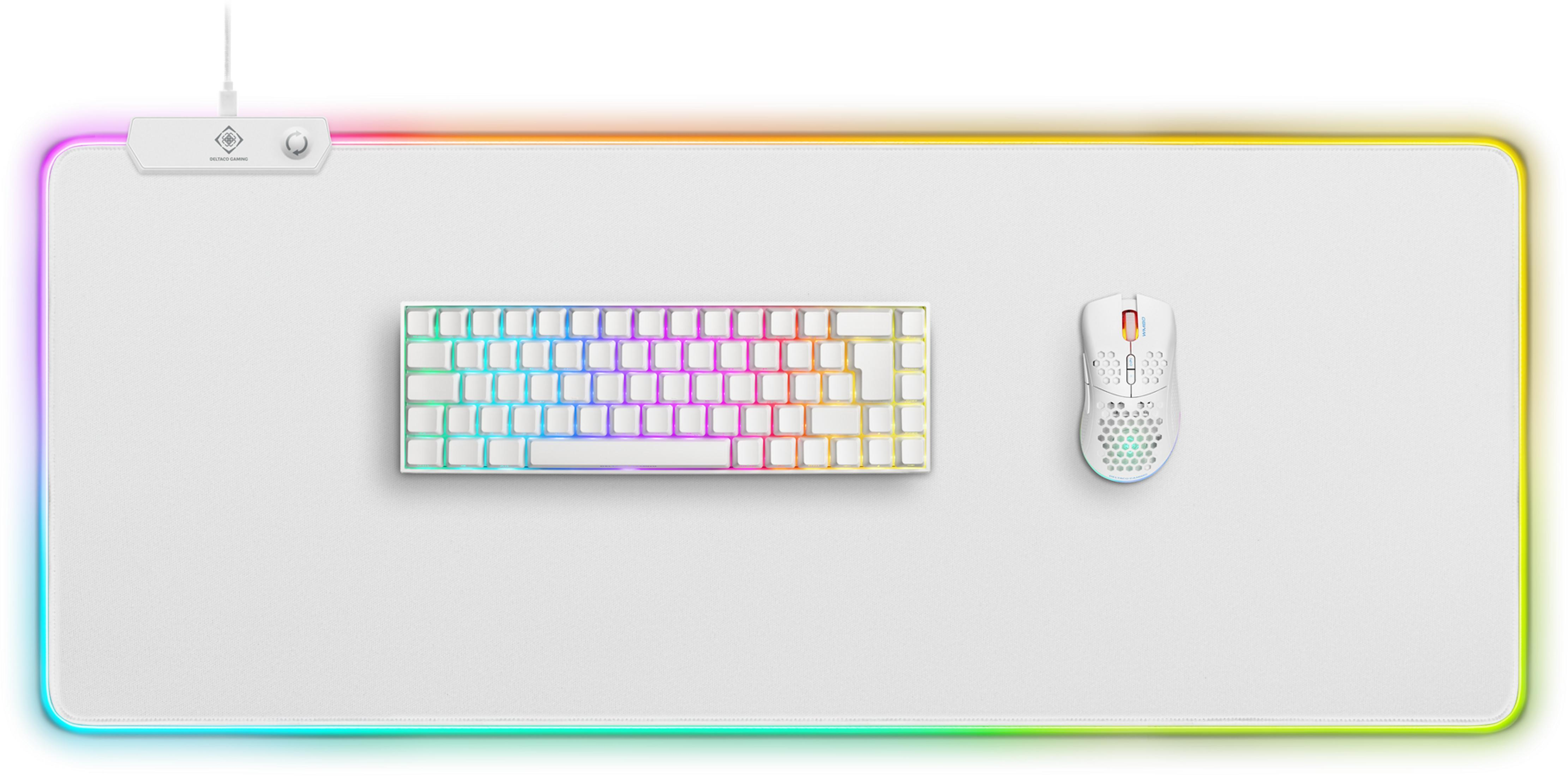 White gaming mouse and keyboard on a large white mat with RGB lighting.