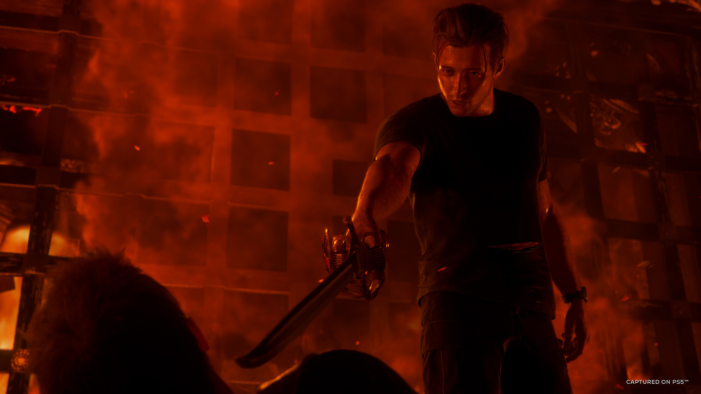 A man with a saber threatens another person amid flames.