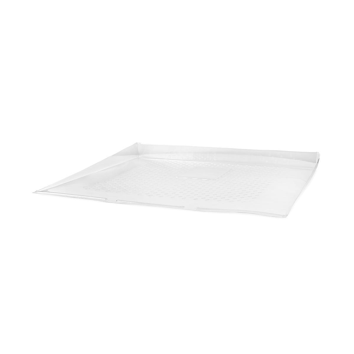 Una bandeja de plástico transparente con un patrón de cuadrados pequeños.