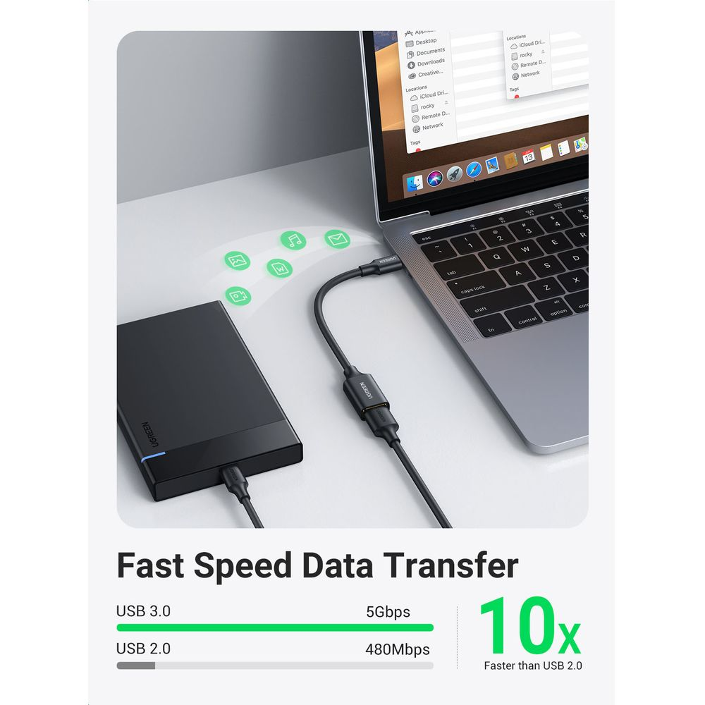 Czarny dysk zewnętrzny podłączony do laptopa, szybki transfer danych.