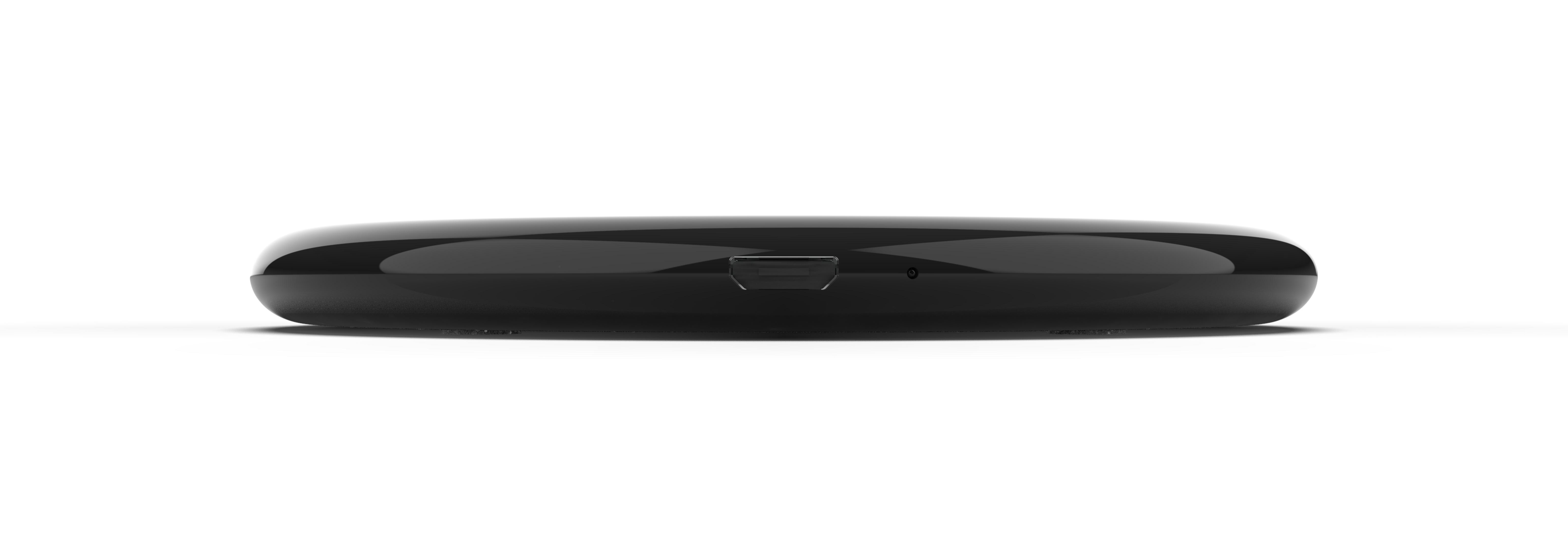 Ein schwarzes, glänzendes, rundes Gerät mit einem USB-Anschluss vorne.