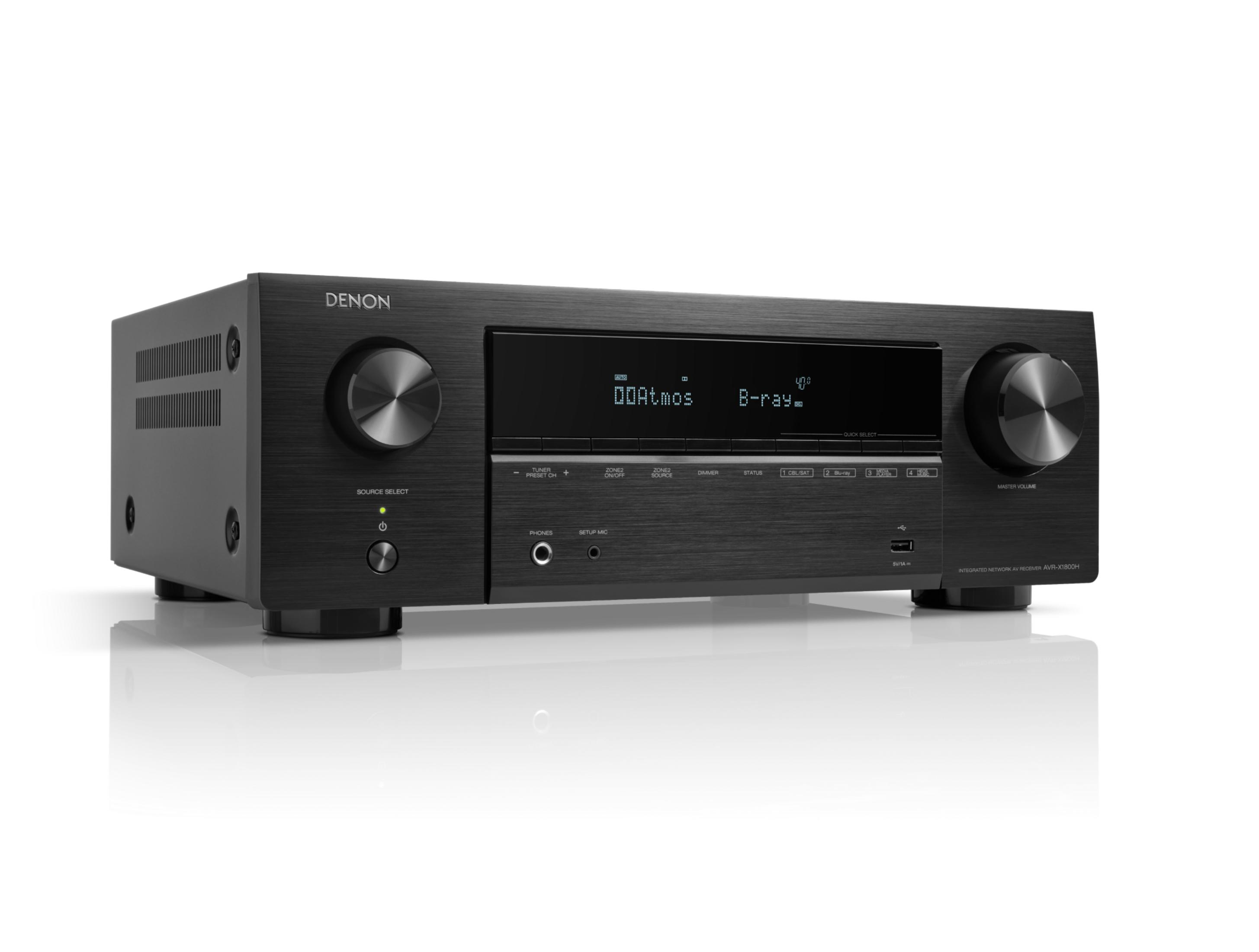 Receptor AV Denon negro con botones plateados y pantalla que muestra "00Atmos B-ray".