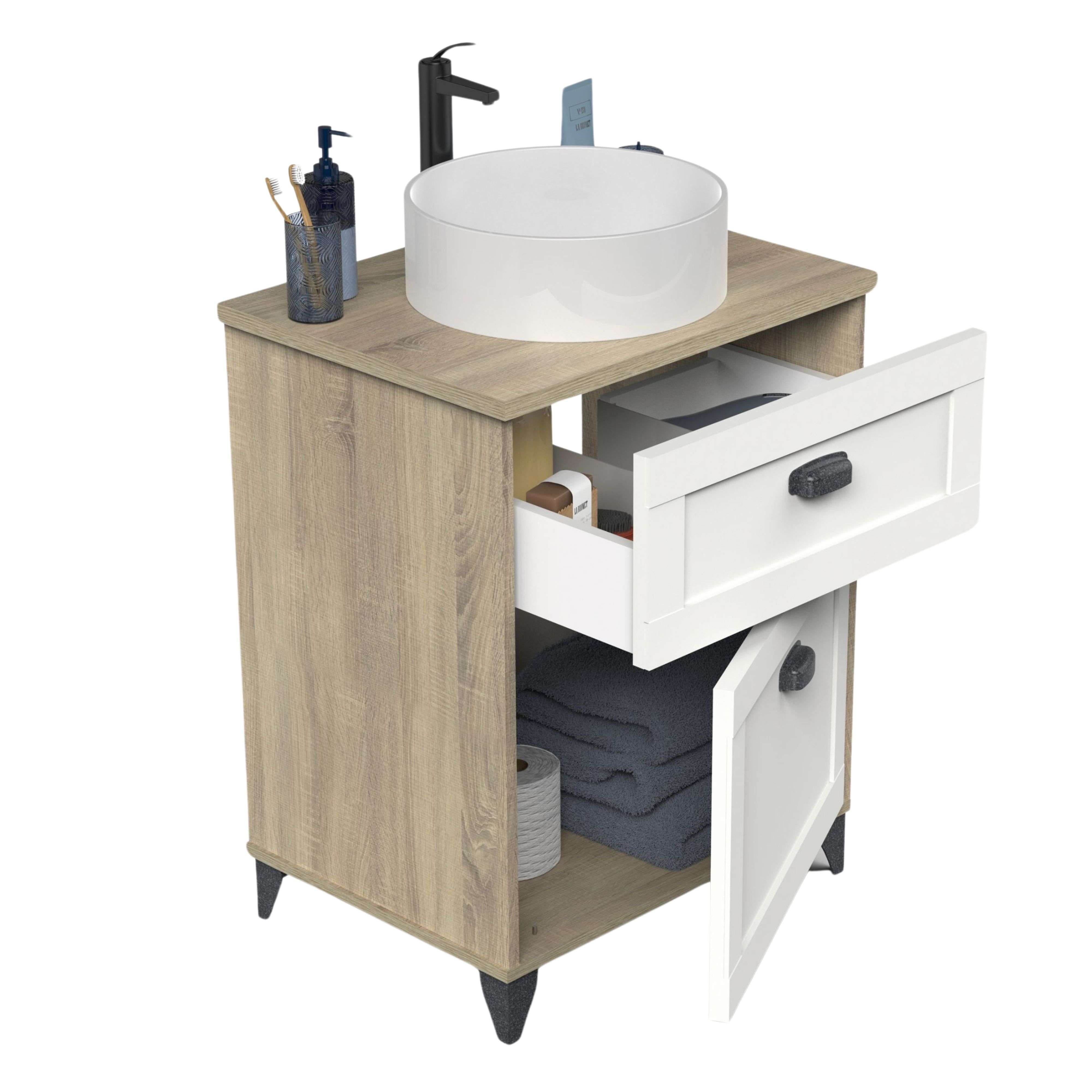 Un mueble de baño con lavabo sobre encimera, grifo, cajones y toallas.