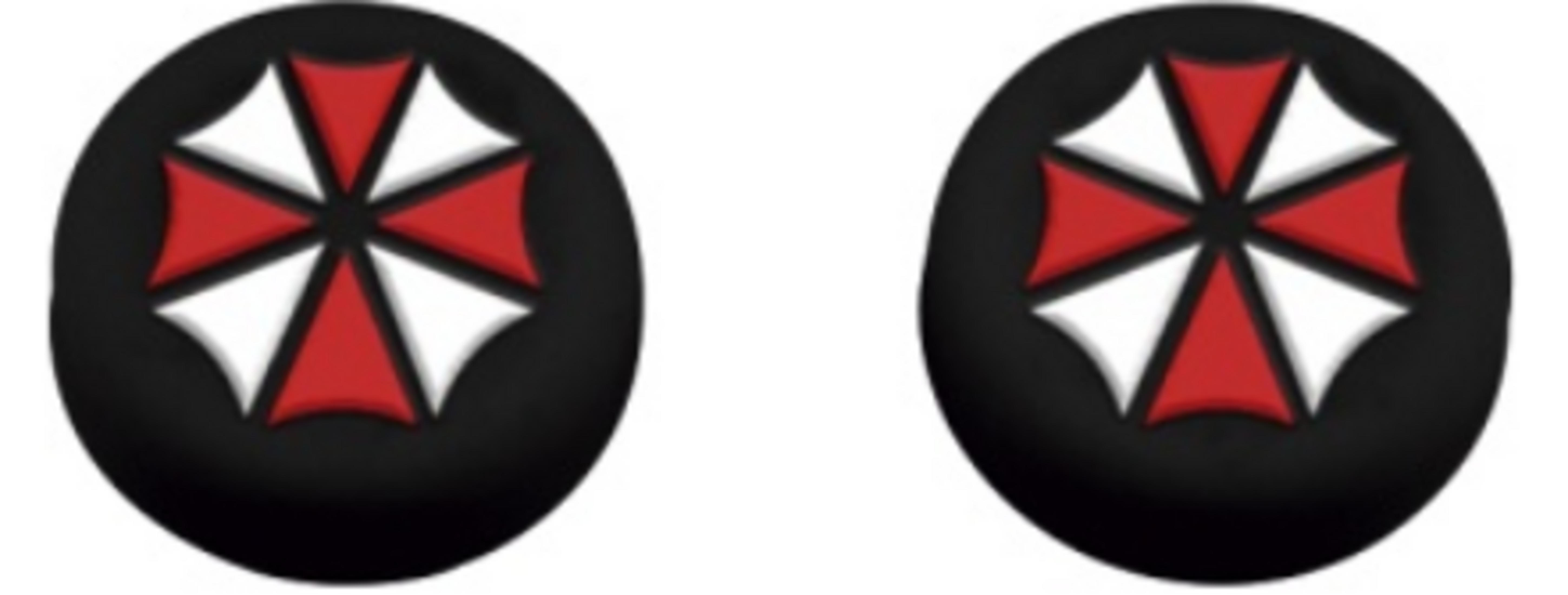 Dwa okrągłe czarne naklejki z czerwono-białym logo parasola.