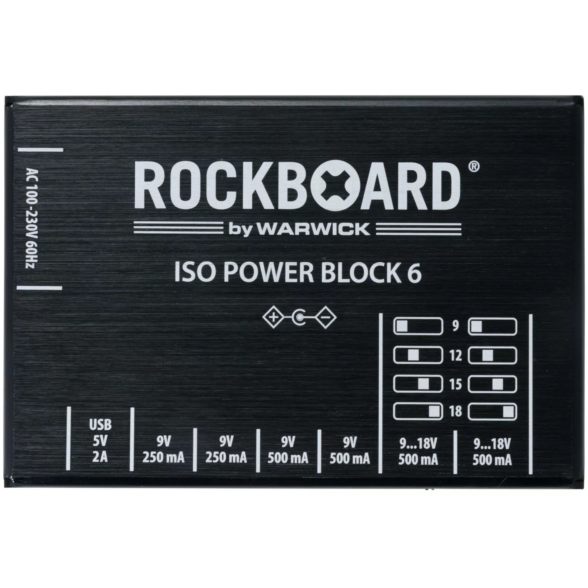Zwart stroomblok met witte tekst: Rockboard, Iso Power Block 6, voltage/stroom specificaties.