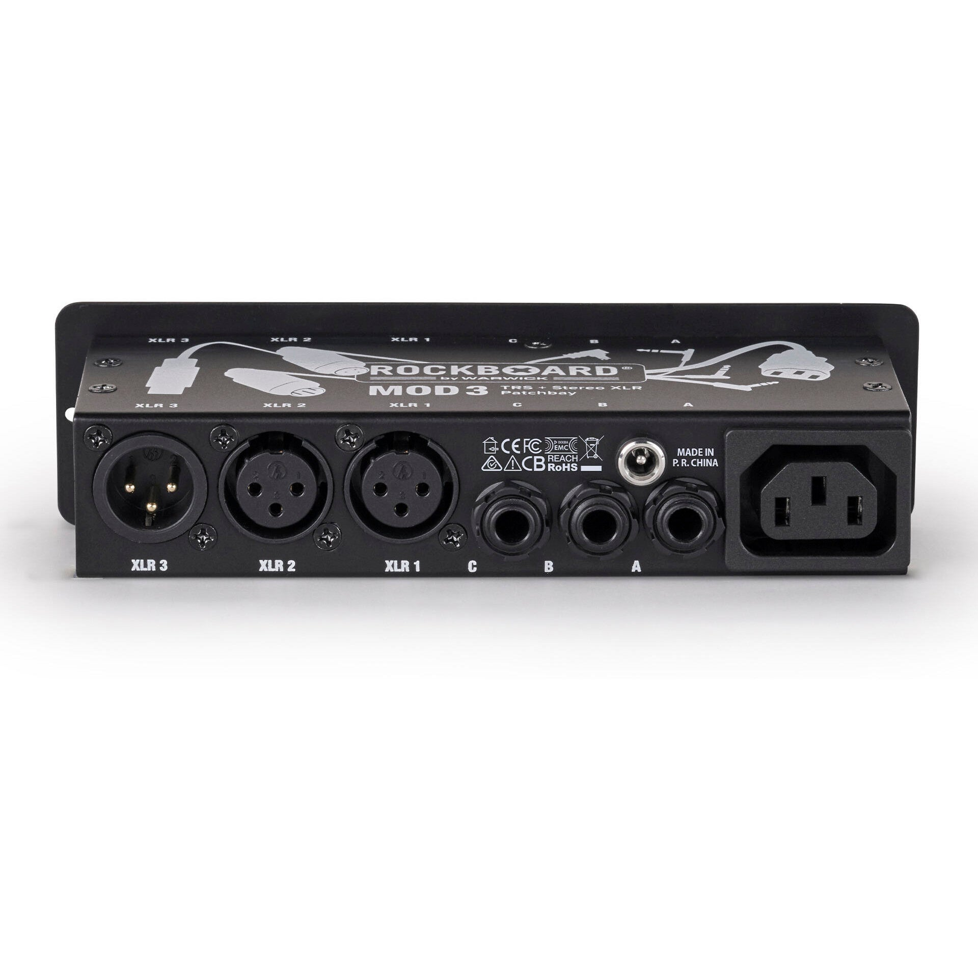 Achterkant van een Rockboard Mod 3 patchbay met XLR, TRS-aansluitingen en stroomconnector.