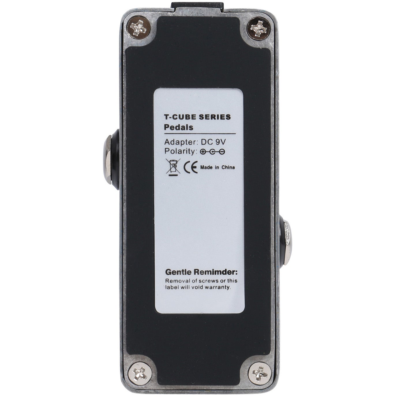 Achterkant van een zwart T-Cube Series pedaal met adapterinfo en CE-markering.