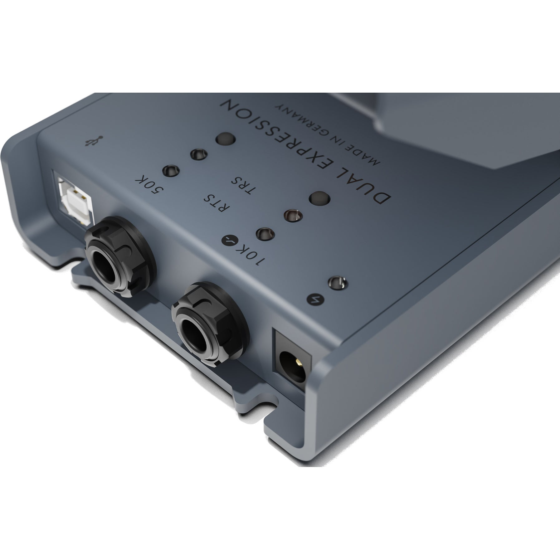 Gray device with ports, LEDs, and labels like 50K, TRS, RTS, 10K.