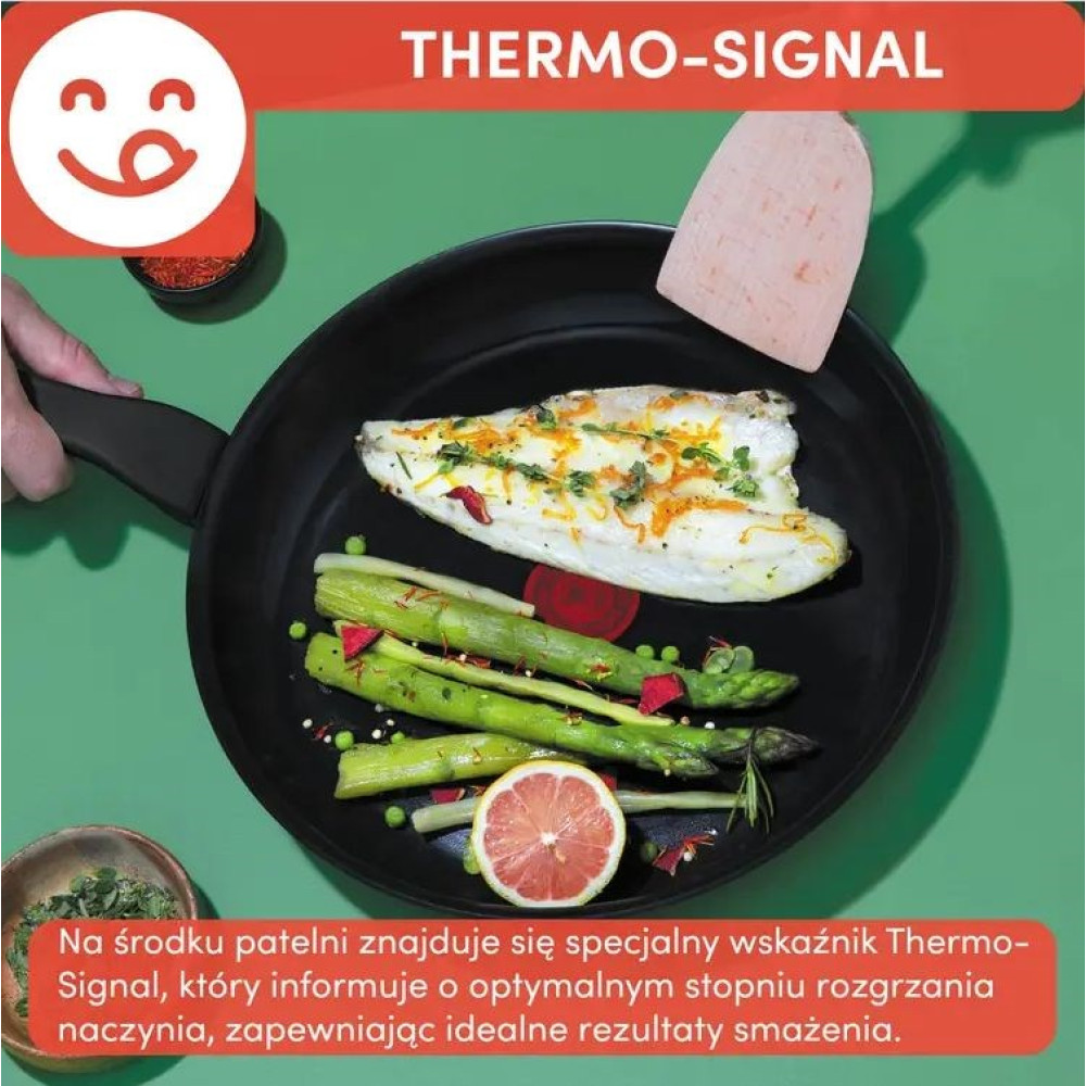 Ryba z szparagami i cytryną na patelni z wskaźnikiem Thermo-Signal.