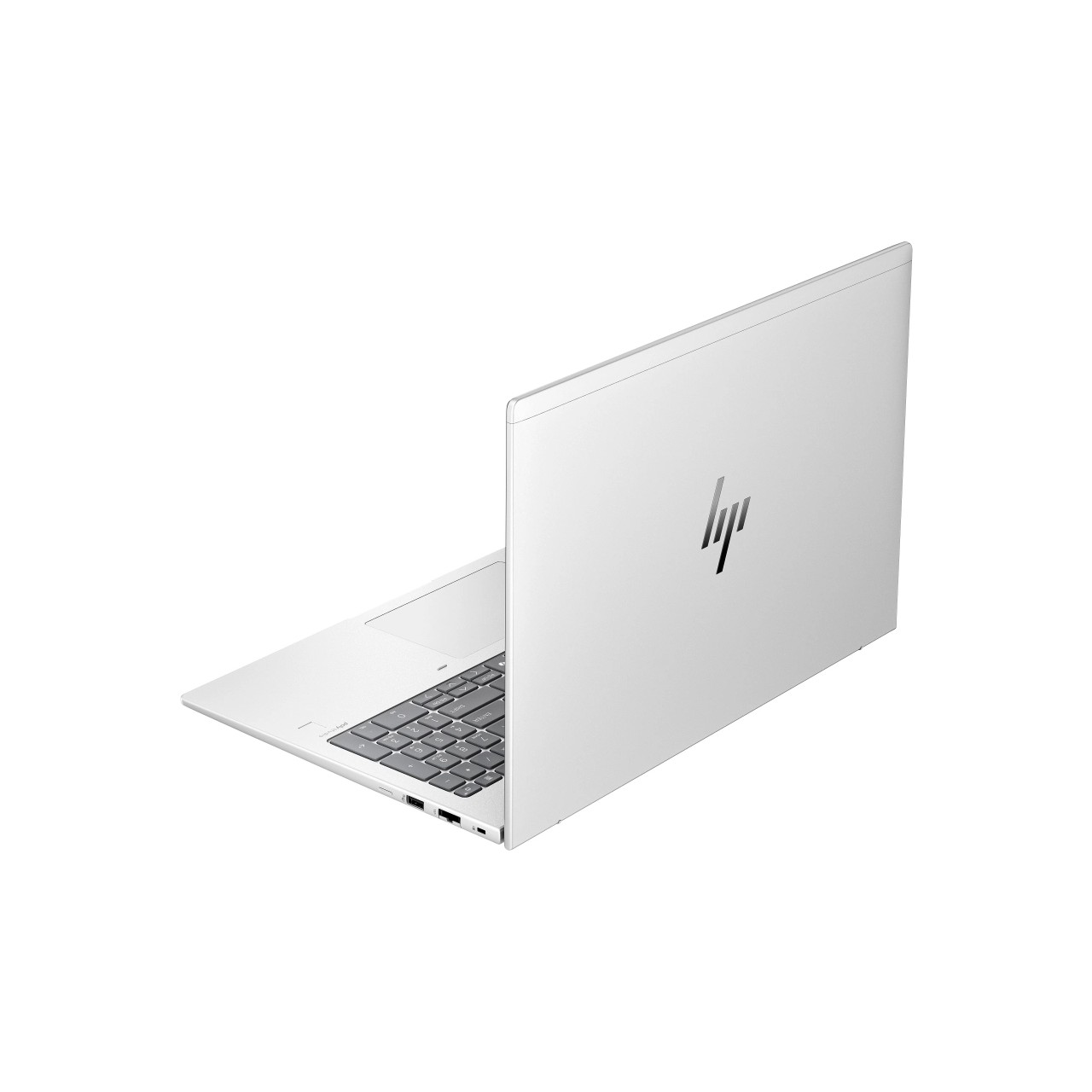 Açık beyaz HP dizüstü bilgisayar, klavyesi ve kapaktaki logosu görünüyor.