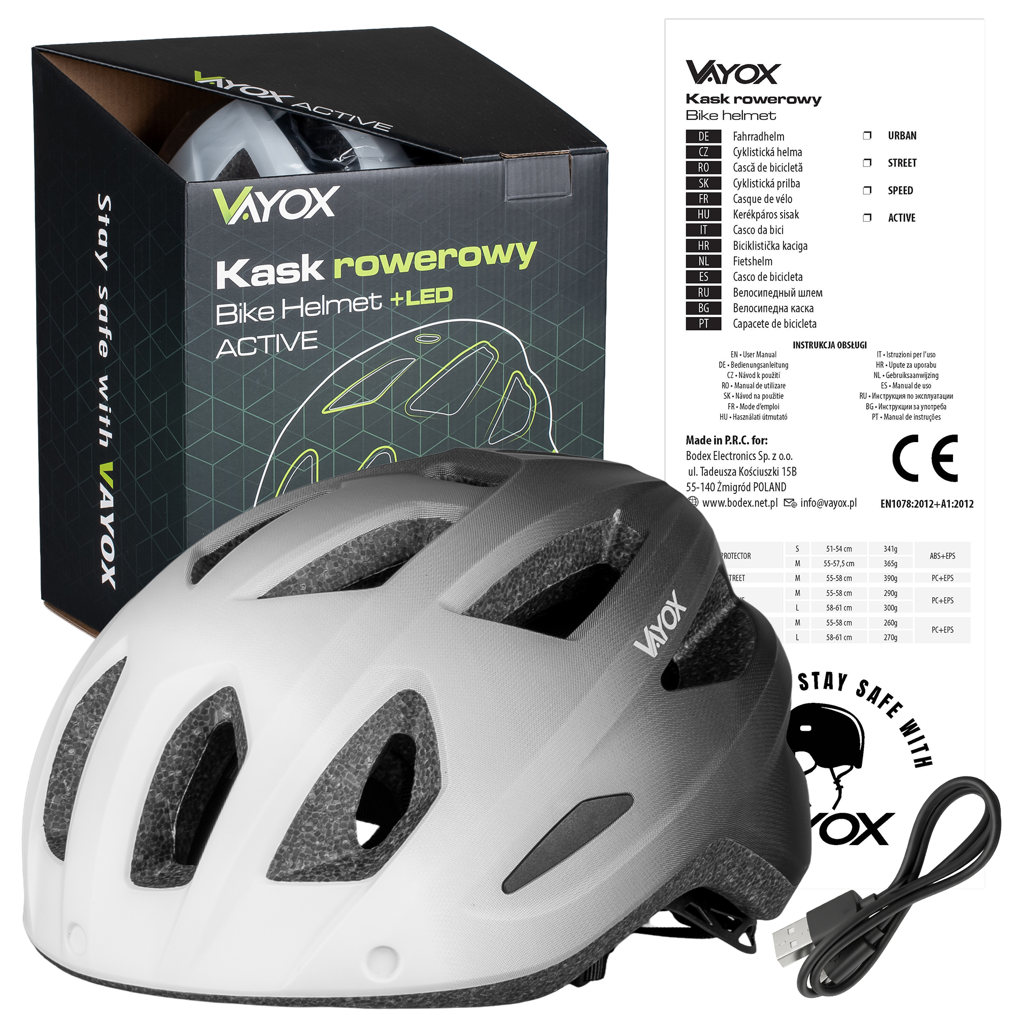 Biało-czarny kask rowerowy Vayox, z pudełkiem i kablem USB.