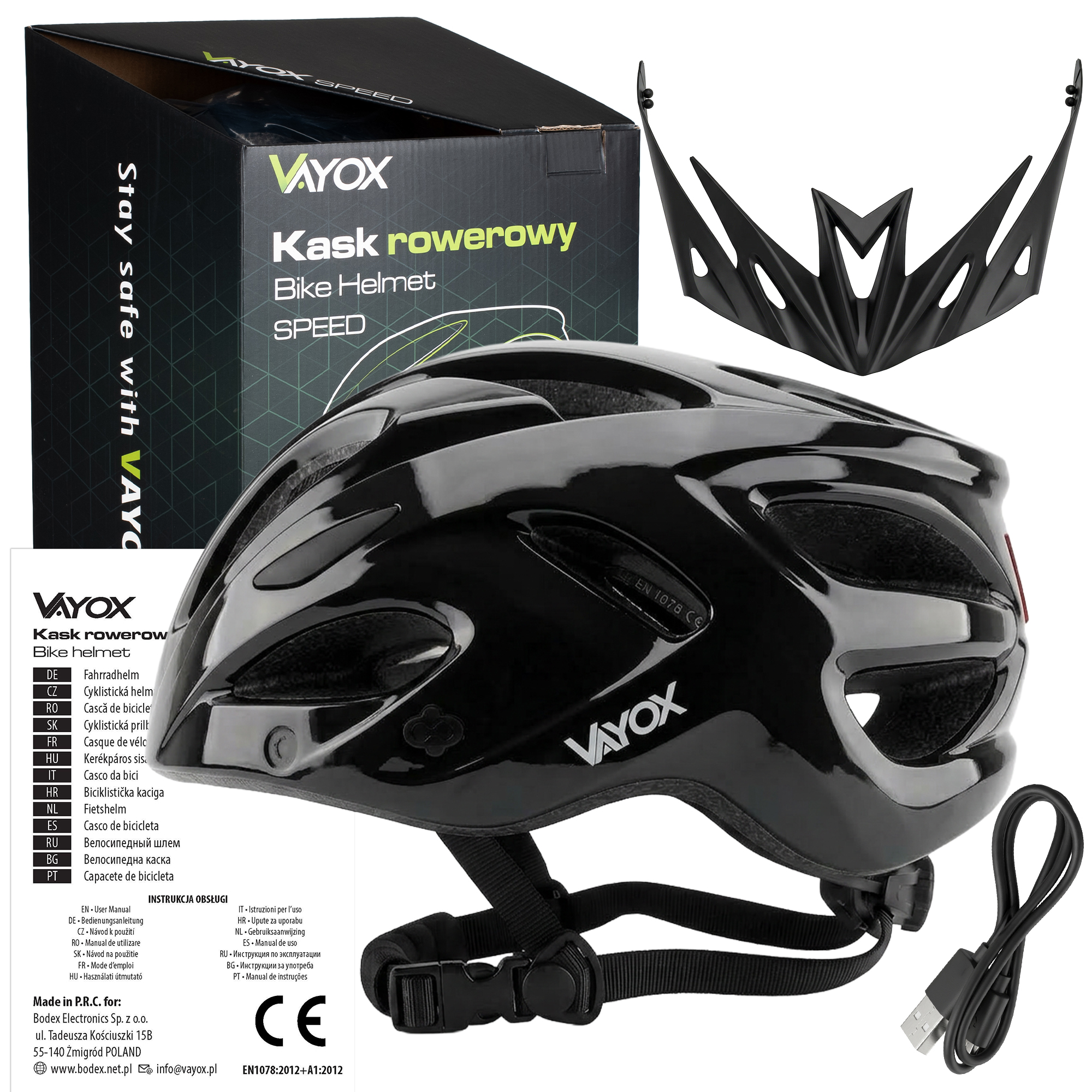 Czarny kask rowerowy Vayox z daszkiem i kablem ładującym na białym tle.