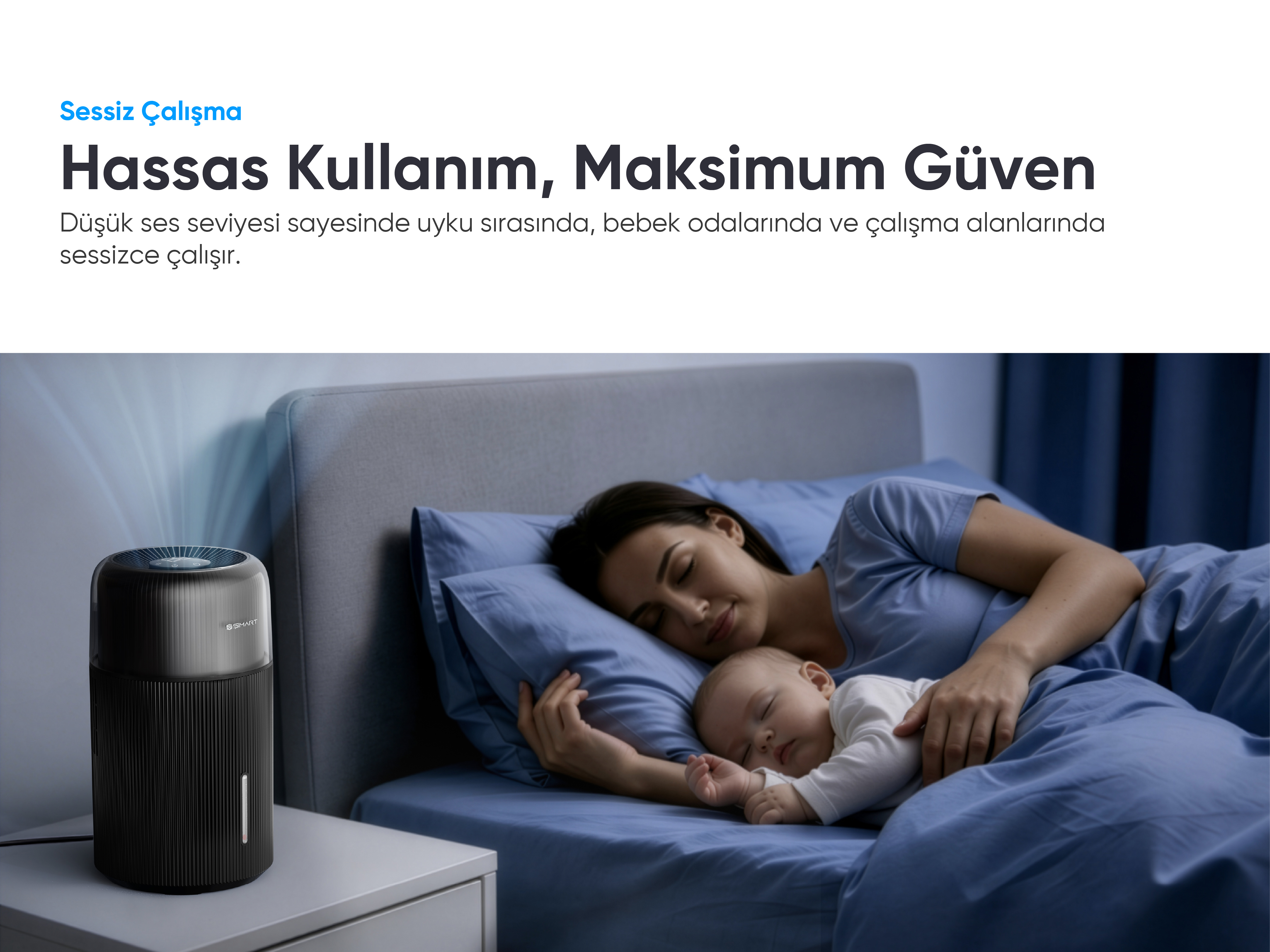Anne ve bebeğin uyuduğu yatağın yanında siyah hava temizleyici duruyor.